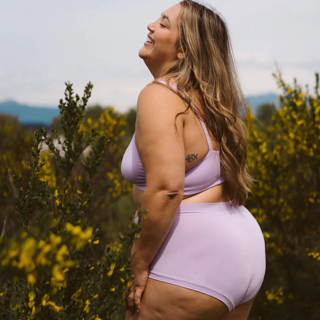 HUHA Mineral Brief lilac TENCEL Modal lifestyle on plus size model side view — Cloud Nine Pajamas Edmonton
