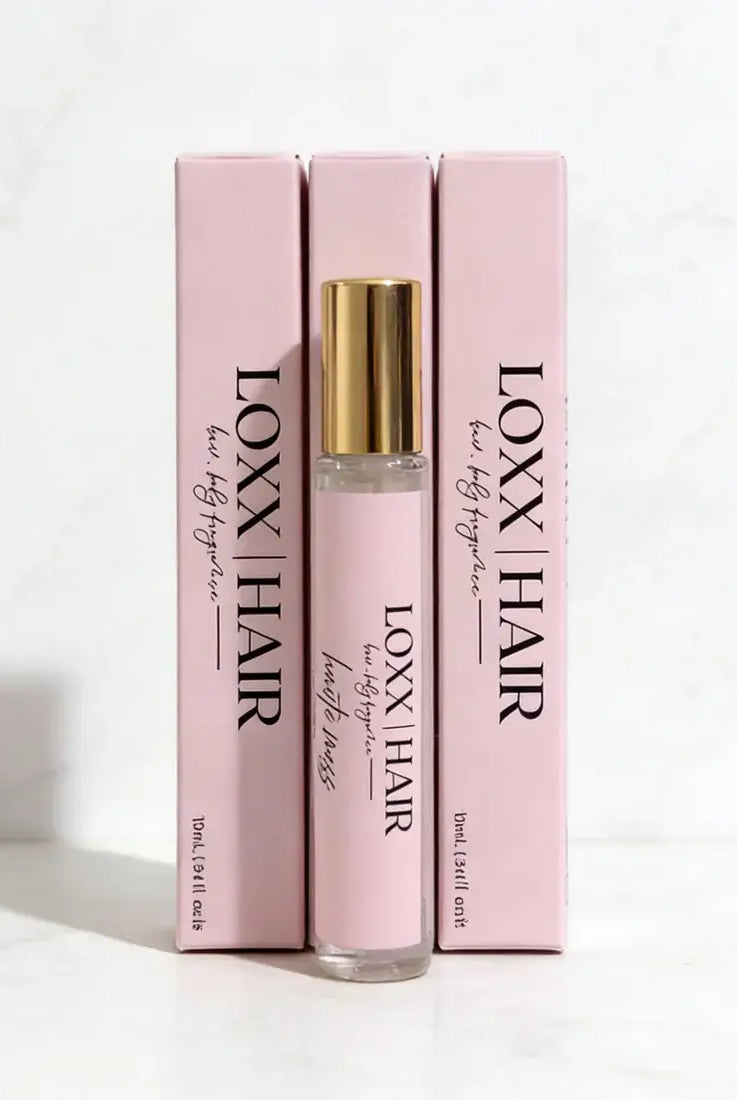 LOXX Haute Mess Hair & Body Fragrance – 10mL Travel Size in elegant packaging with gold accents.
