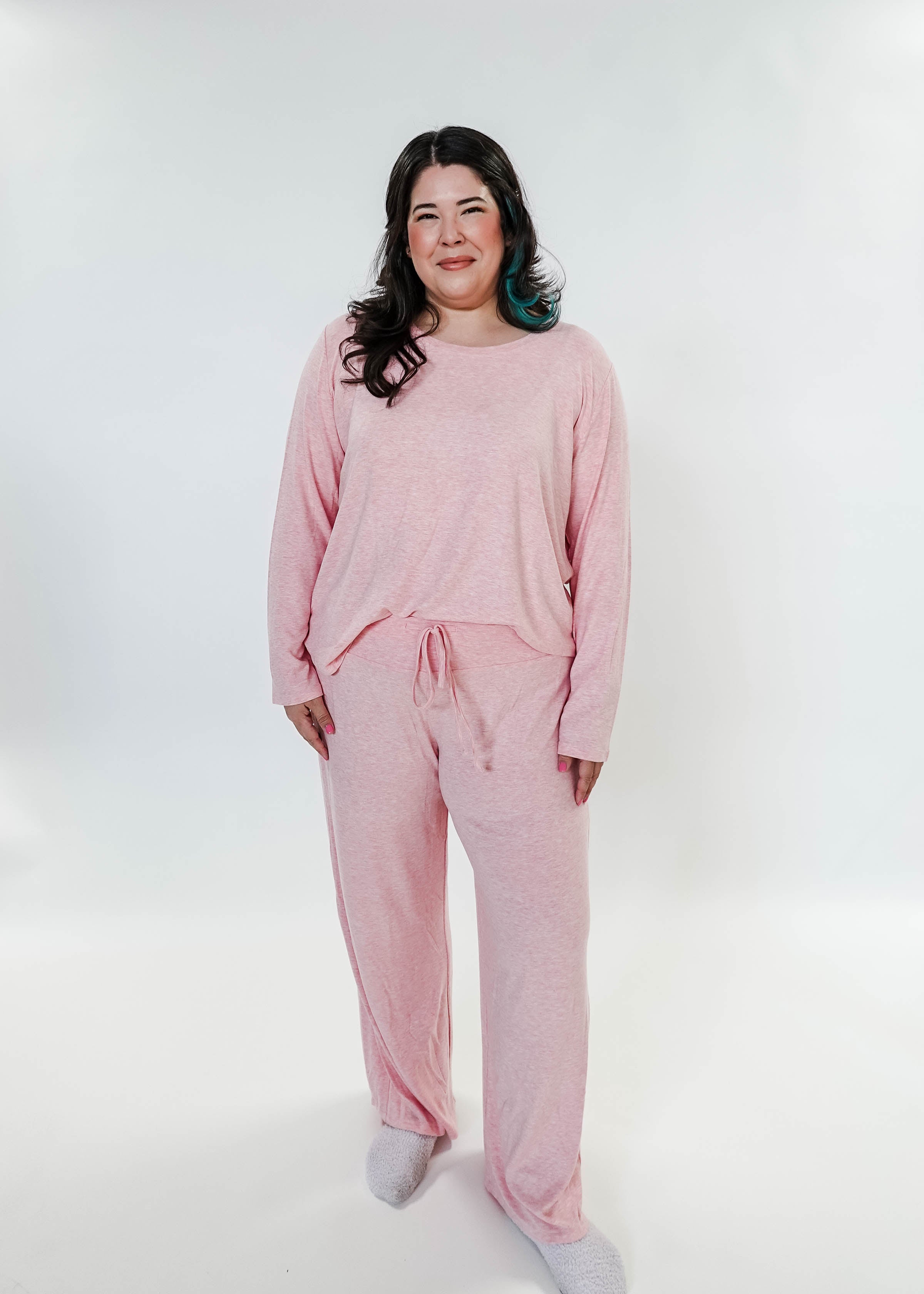 plus size woman standing wearing heather pink lounge set by miranda nic