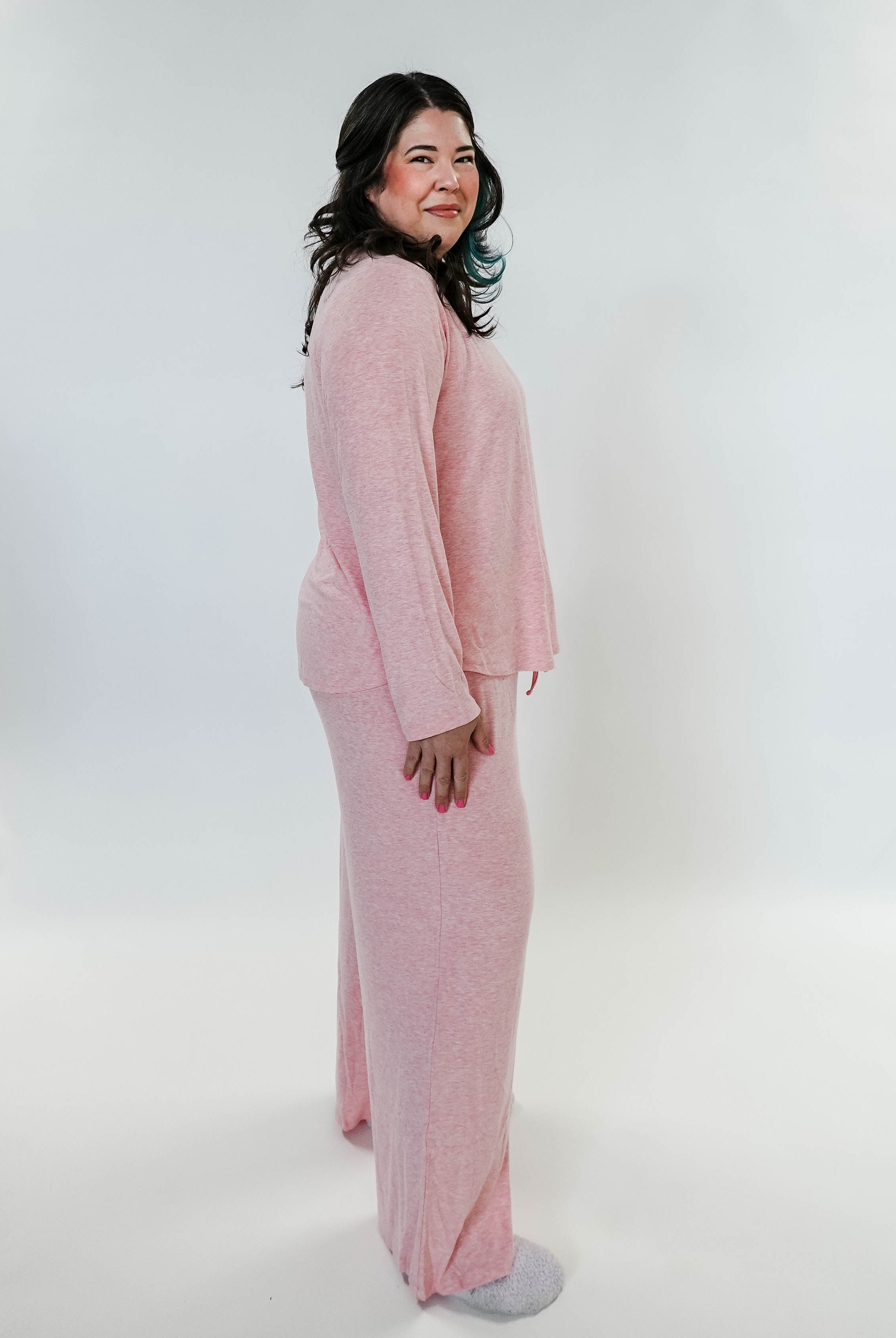 plus size woman standing wearing heather pink lounge set by miranda nic