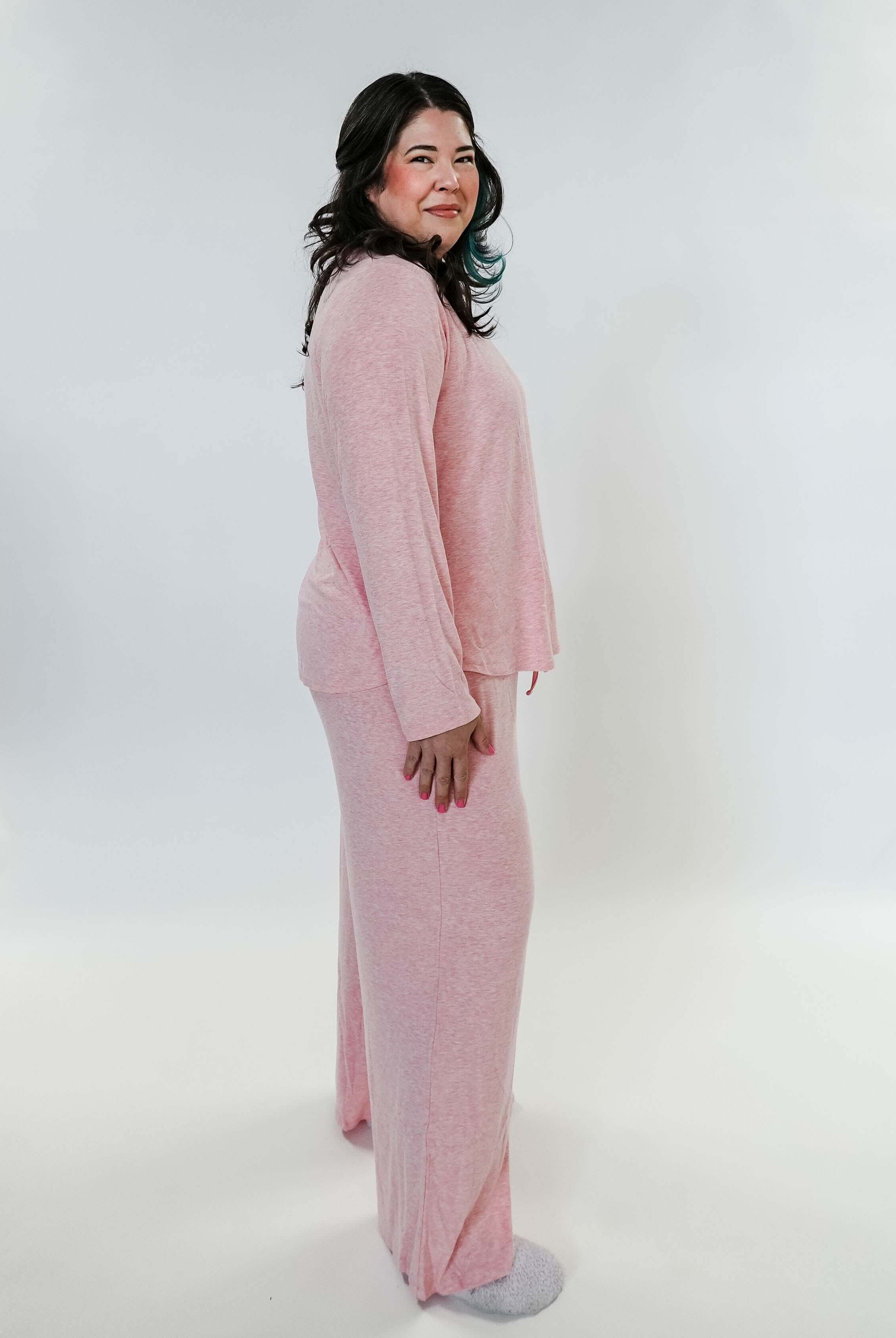 plus size woman standing wearing heather pink lounge set by miranda nic