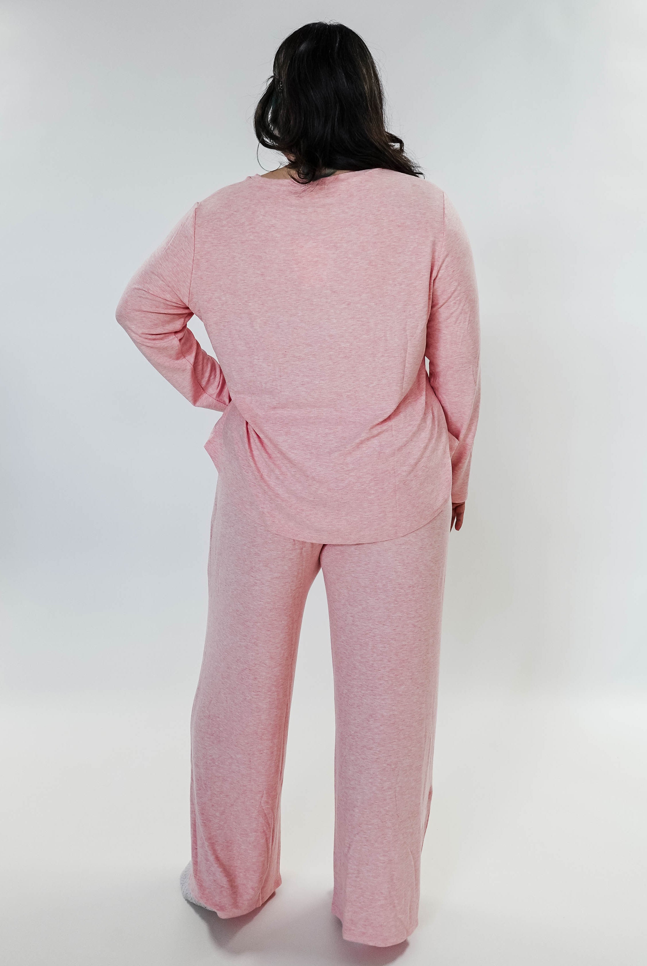 plus size woman standing wearing heather pink lounge set by miranda nic