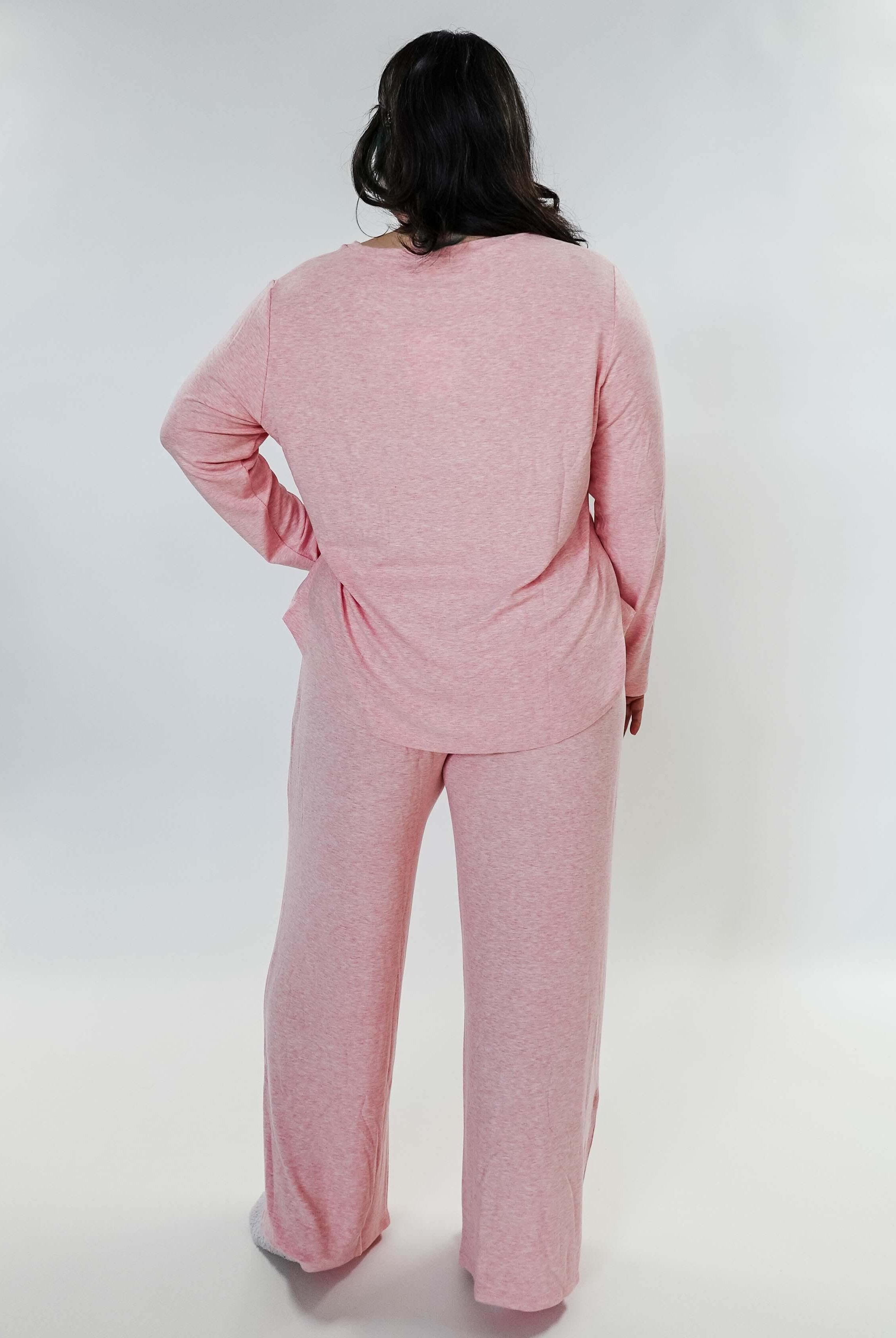 plus size woman standing wearing heather pink lounge set by miranda nic