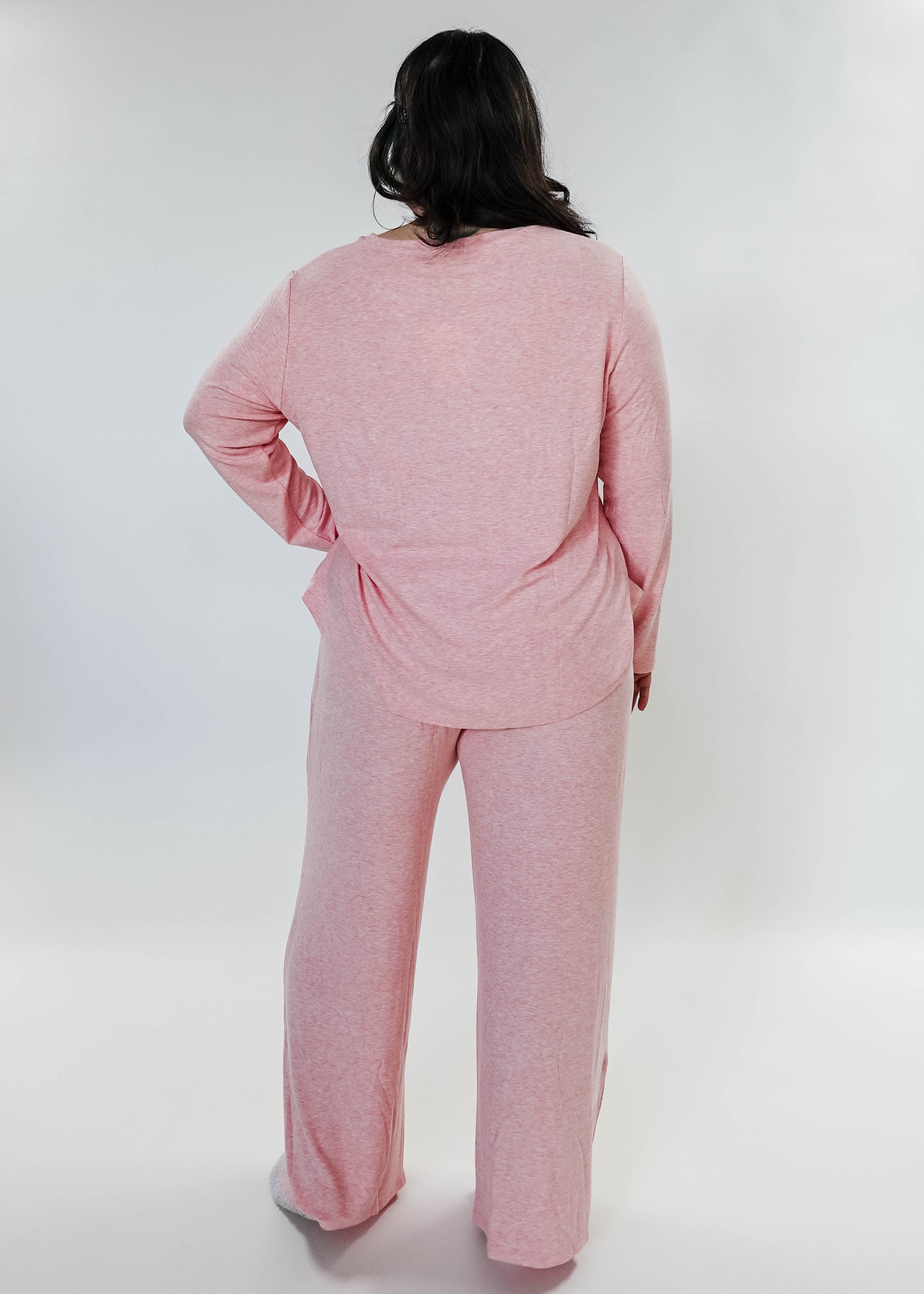 plus size woman standing wearing heather pink lounge set by miranda nic