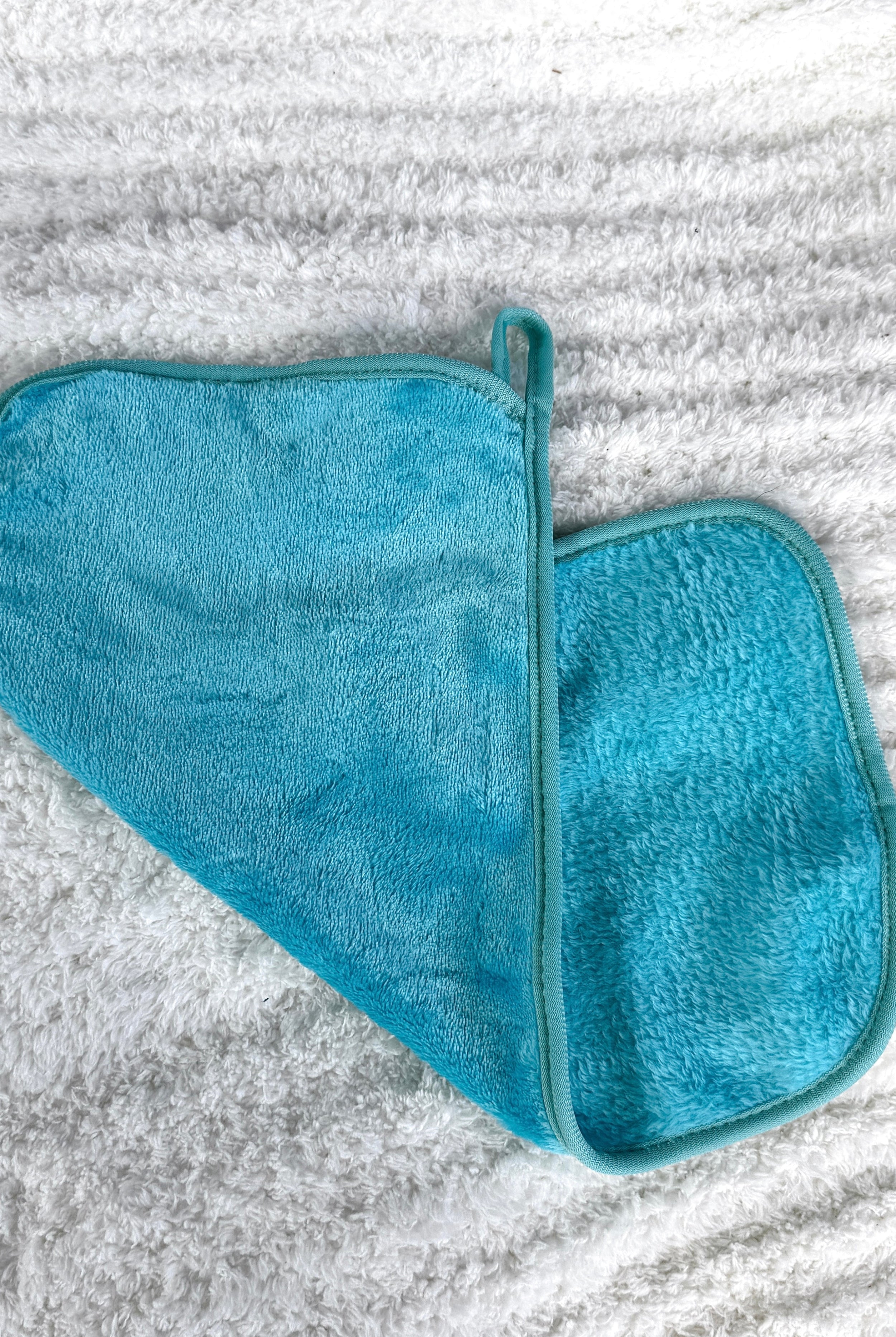 remove it makeup removing cloth aqua showing texture of cloth and handy hanging loop