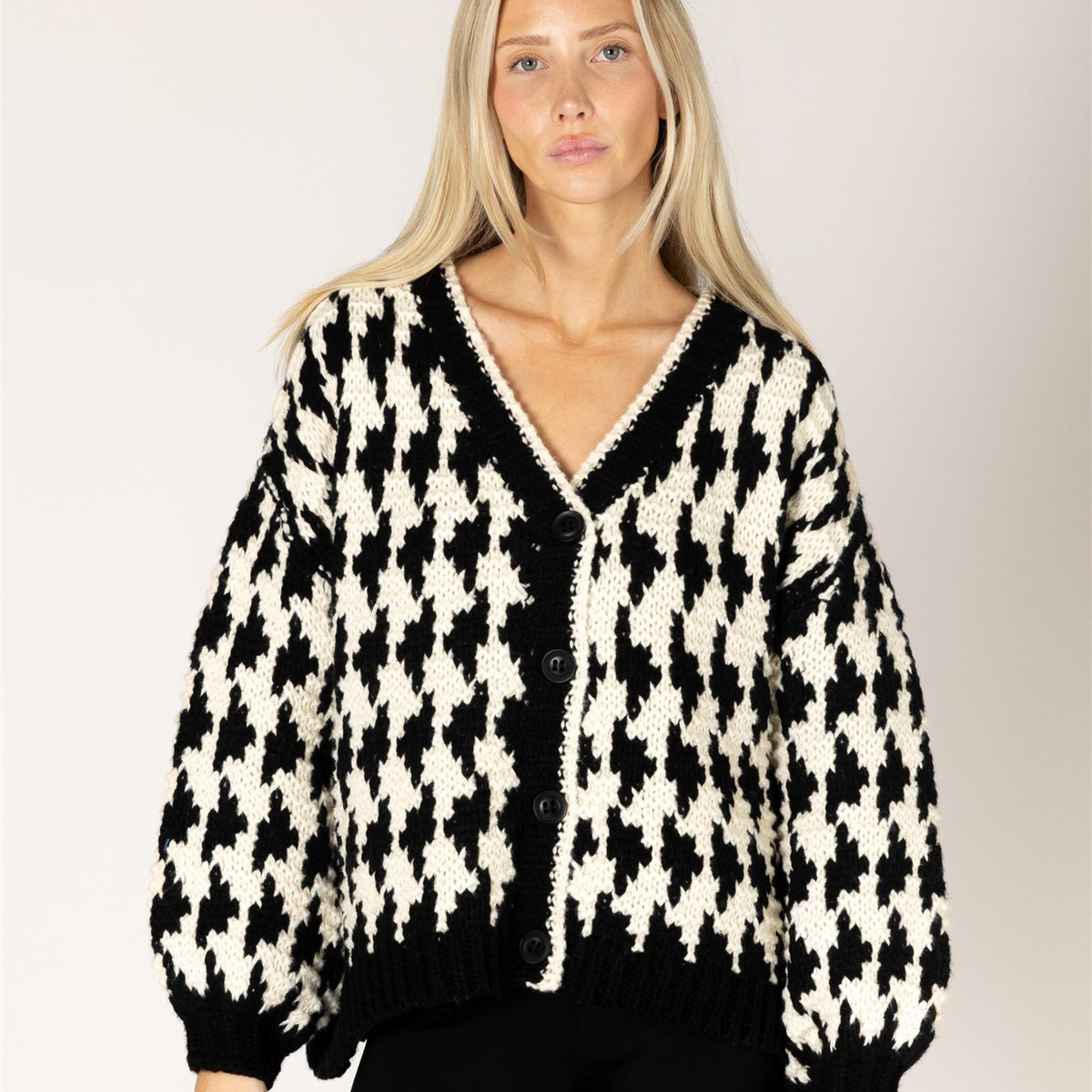 Lyla & Luxe Libby Black Cream hand-knit cardigan lifestyle — Cloud Nine Pajamas
