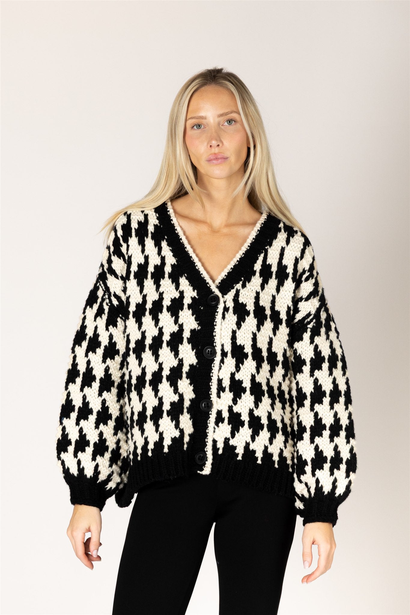 Lyla & Luxe Libby Black Cream hand-knit cardigan lifestyle — Cloud Nine Pajamas