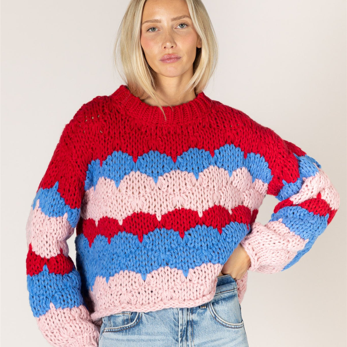 Lyla & Luxe LYNN hand-knit red blue pink chunky stripe crew neck sweater — model wearing Small — Cloud Nine Pajamas Edmonton