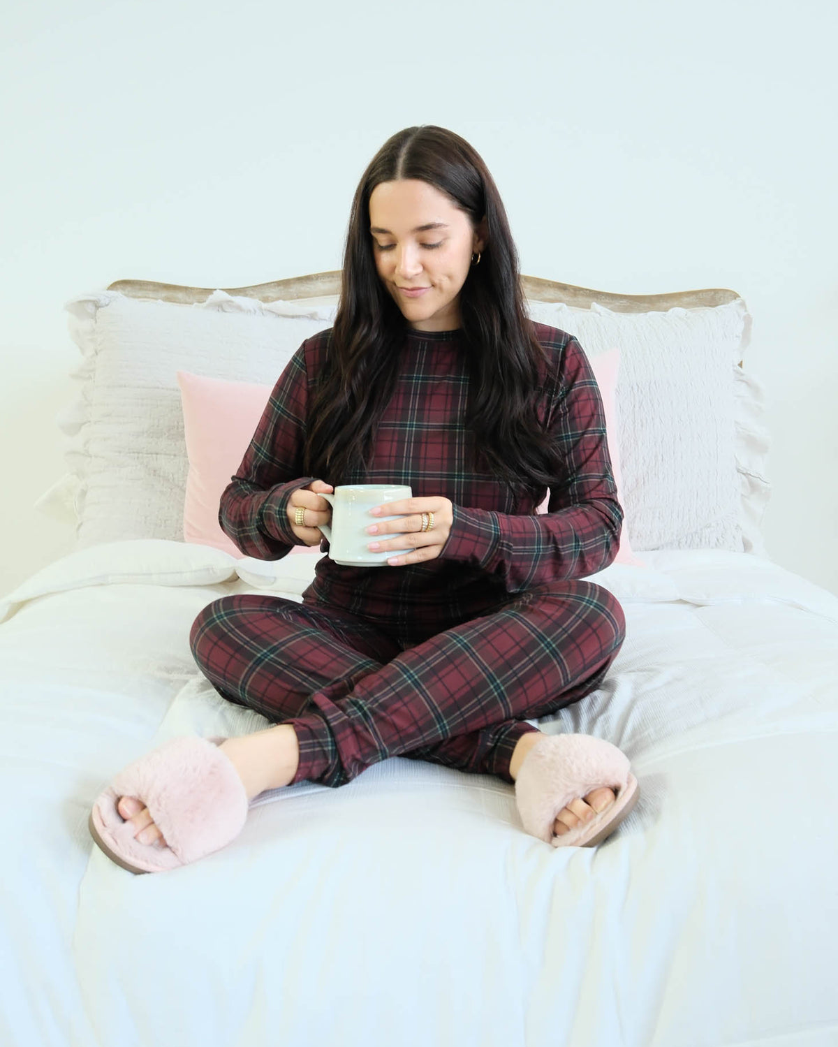 Georgia Rylan Bamboo Plaid PJ Set model seated on bed with mug lifestyle — Cloud Nine Pajamas Edmonton
