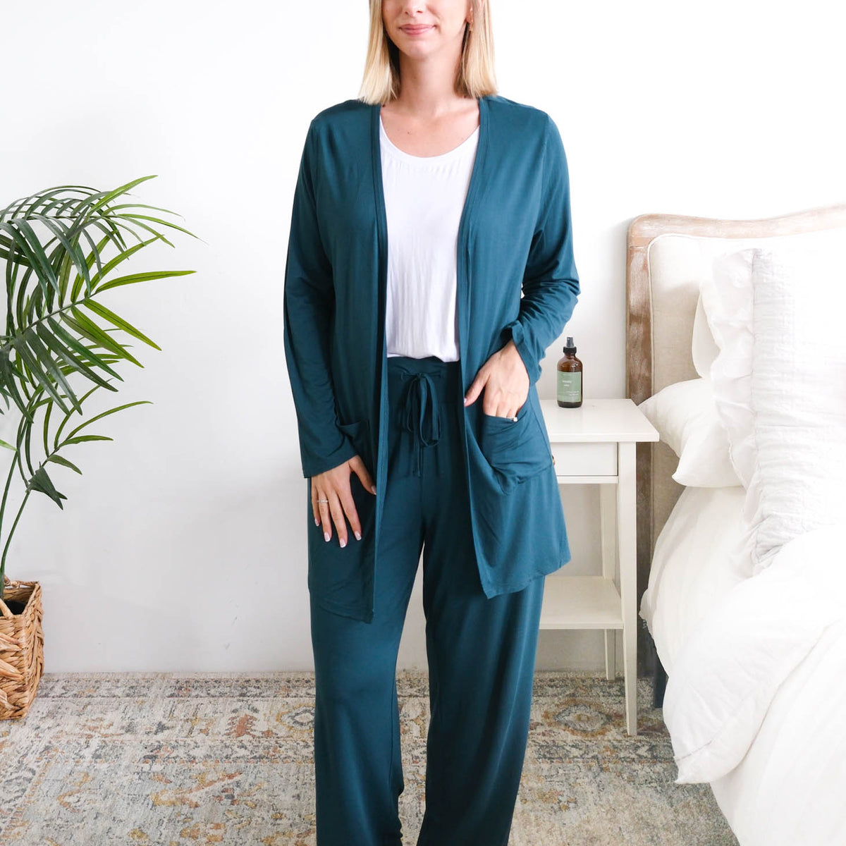 Georgia Rylan Long Bamboo Cardigan with Pockets Midnight Teal front view on model — Cloud Nine Pajamas Edmonton