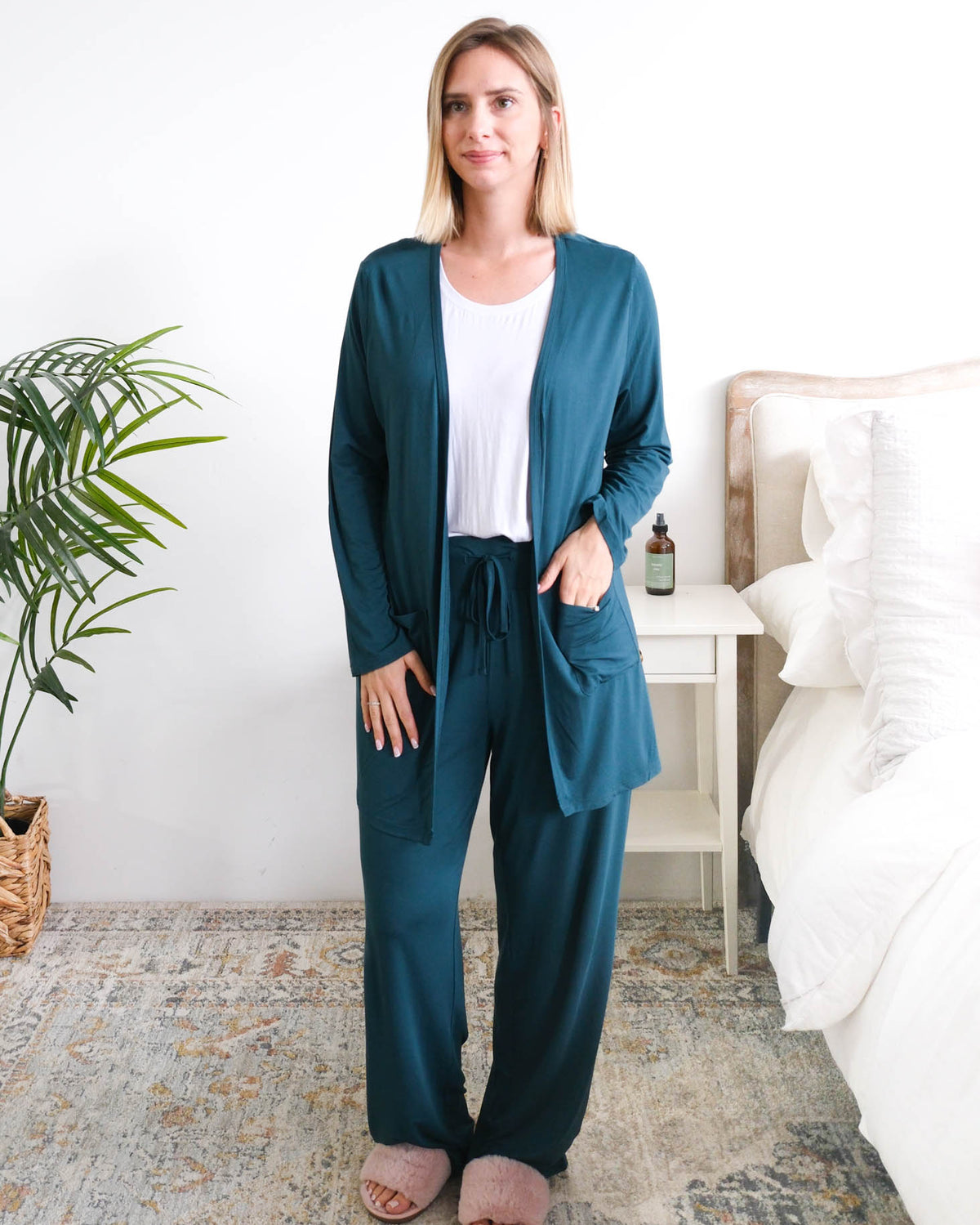 Georgia Rylan Long Bamboo Cardigan with Pockets Midnight Teal front view on model — Cloud Nine Pajamas Edmonton