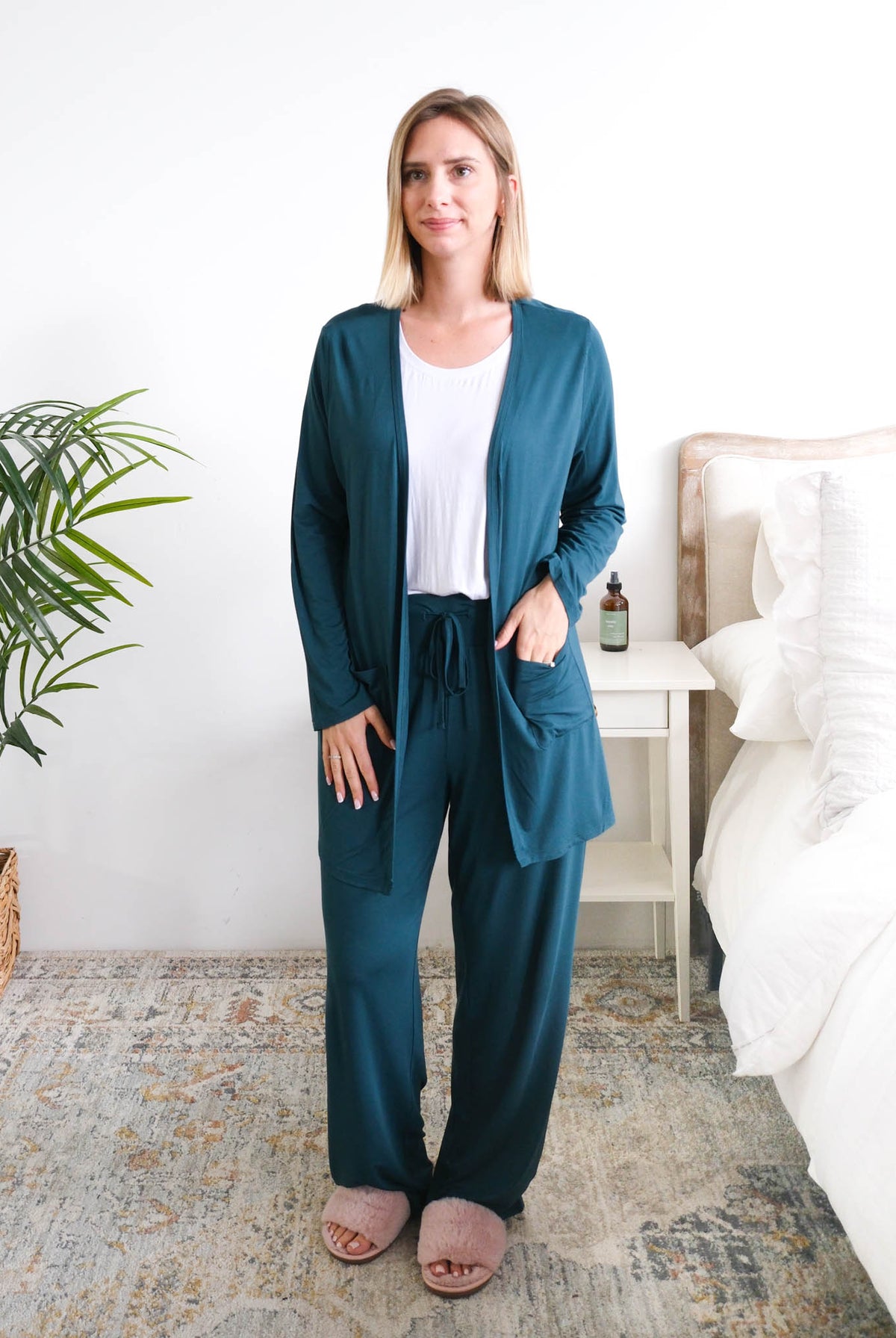 Georgia Rylan Long Bamboo Cardigan with Pockets Midnight Teal front view on model — Cloud Nine Pajamas Edmonton
