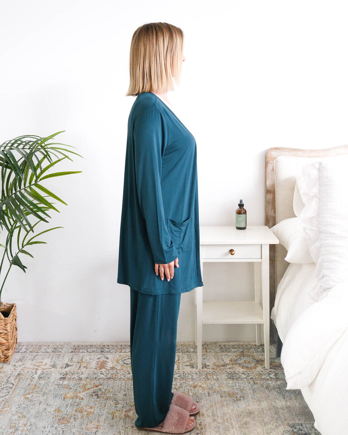 Georgia Rylan Midnight Teal Bamboo Cardigan model side view showing length — Cloud Nine Pajamas