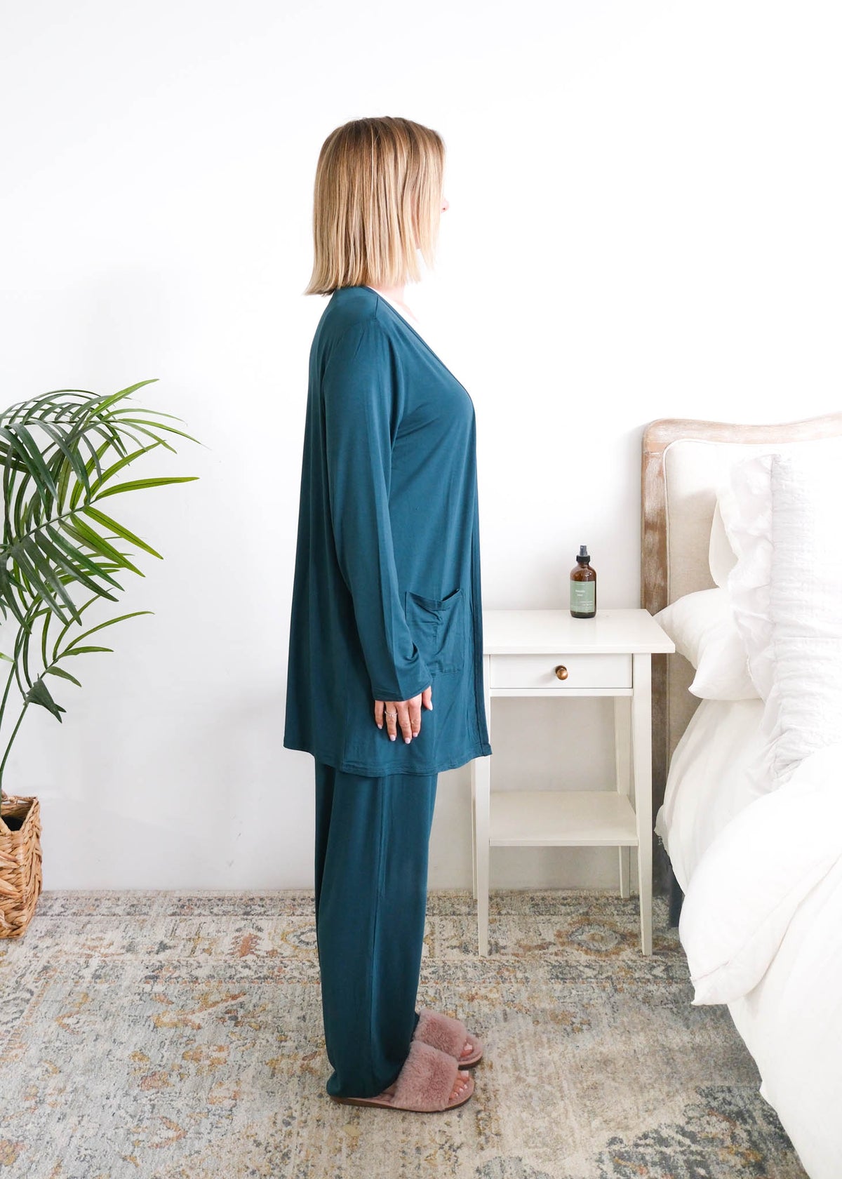 Georgia Rylan Midnight Teal Bamboo Cardigan model side view showing length — Cloud Nine Pajamas