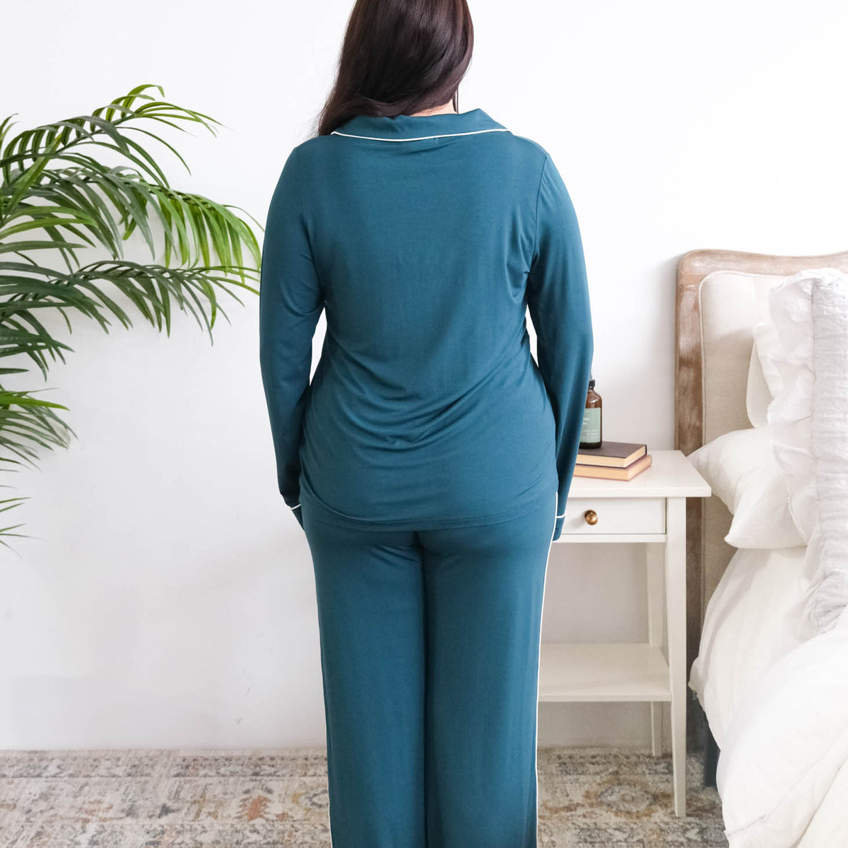 Georgia Rylan Midnight Teal Long Sleeve Bamboo PJ Set model back view — Cloud Nine Pajamas