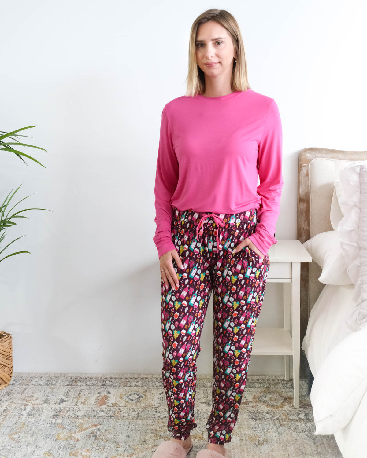 Georgia Rylan Wine Tasting Bamboo Jogger Set model full length with shirt tucked in — Cloud Nine Pajamas