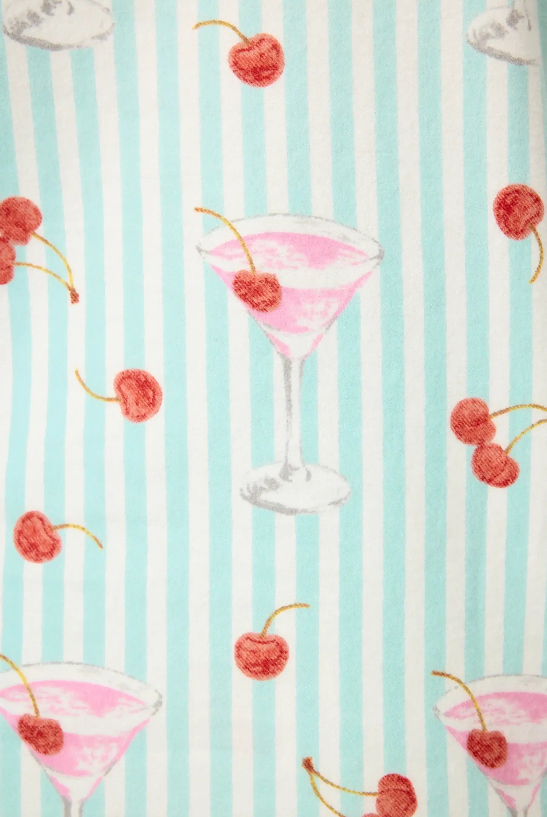 Ma Cherie Cherry Print featuring cocktails and cherries on a blue striped background.