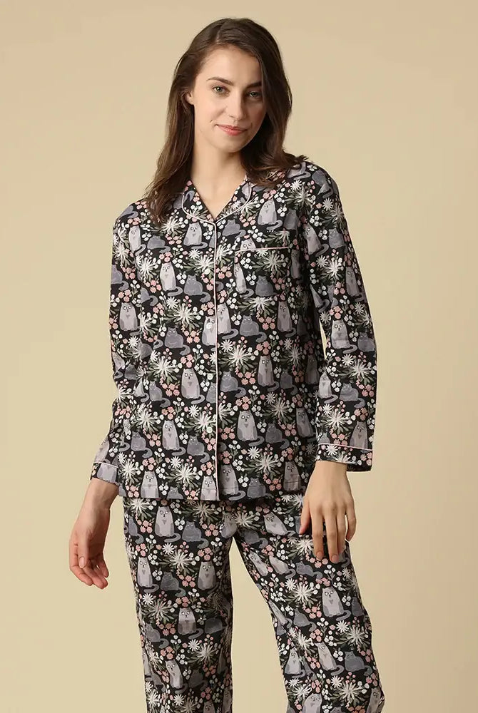Kitty Cat Cotton Button Up Long Sleeve PJ Set featuring grey cats among flowers, modeled by a woman.