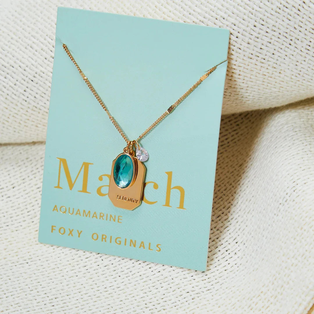 Birthstone Charm Necklace in 14k Plated Gold featuring aquamarine stone and serenity intention for March.