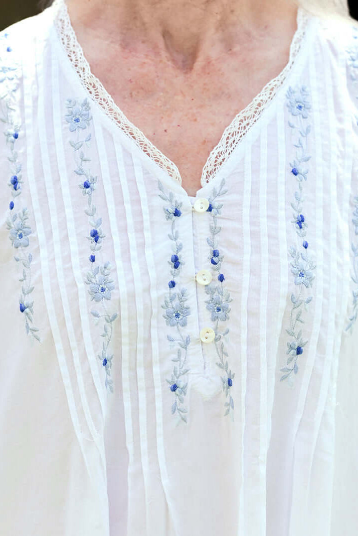April Cornell Cottage Scatter Cotton Nightgown showing close up of the delicate blue floral embroidery