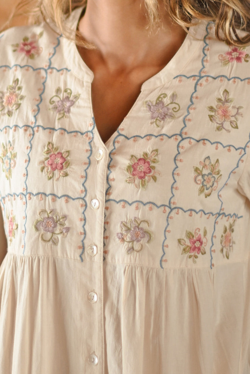 Close up of the embroidery on the April Cornell Embroidery Sampler Nighty in ecru cotton, showing the delicate floral threadwork