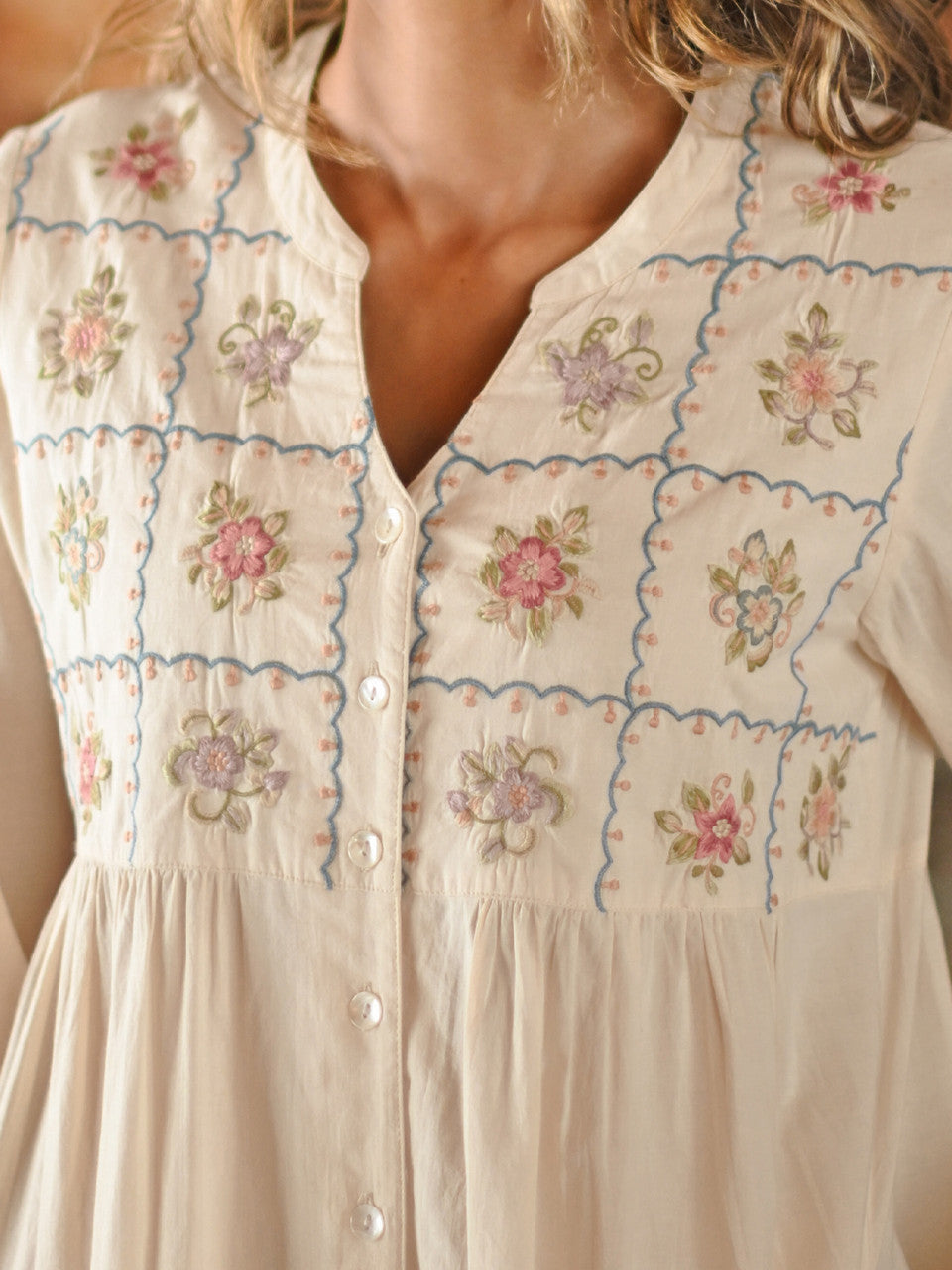 Close up of the embroidery on the April Cornell Embroidery Sampler Nighty in ecru cotton, showing the delicate floral threadwork