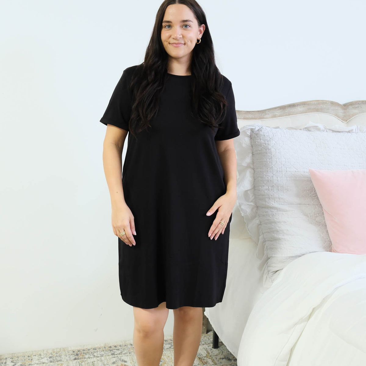 Miranda Nic Cloud Soft Rolled Sleeve Dress Black front view standing beside bed — Cloud Nine Pajamas Edmonton