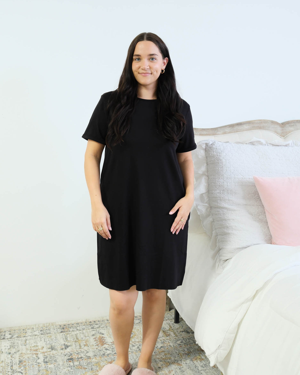Miranda Nic Cloud Soft Rolled Sleeve Dress Black front view standing beside bed — Cloud Nine Pajamas Edmonton