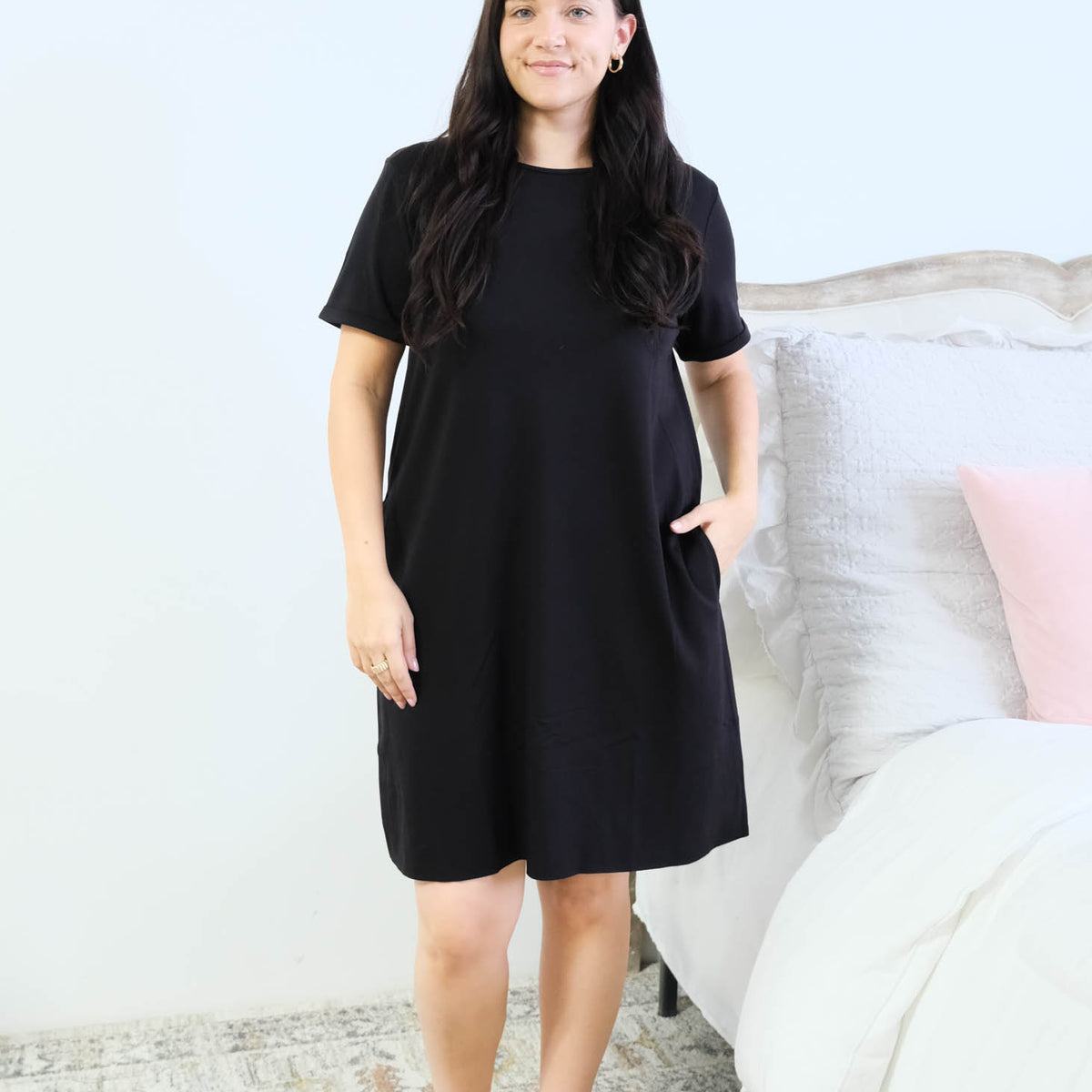 Miranda Nic Cloud Soft Rolled Sleeve Dress Black front view hand in pocket detail — Cloud Nine Pajamas Edmonton