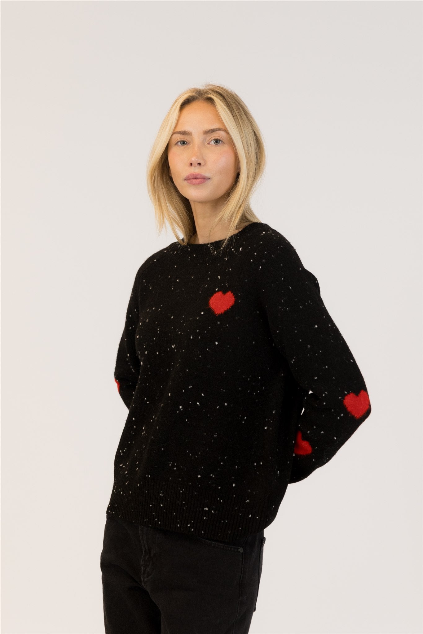 women's fall pullover sweater black with red heart detail lyla + luxe