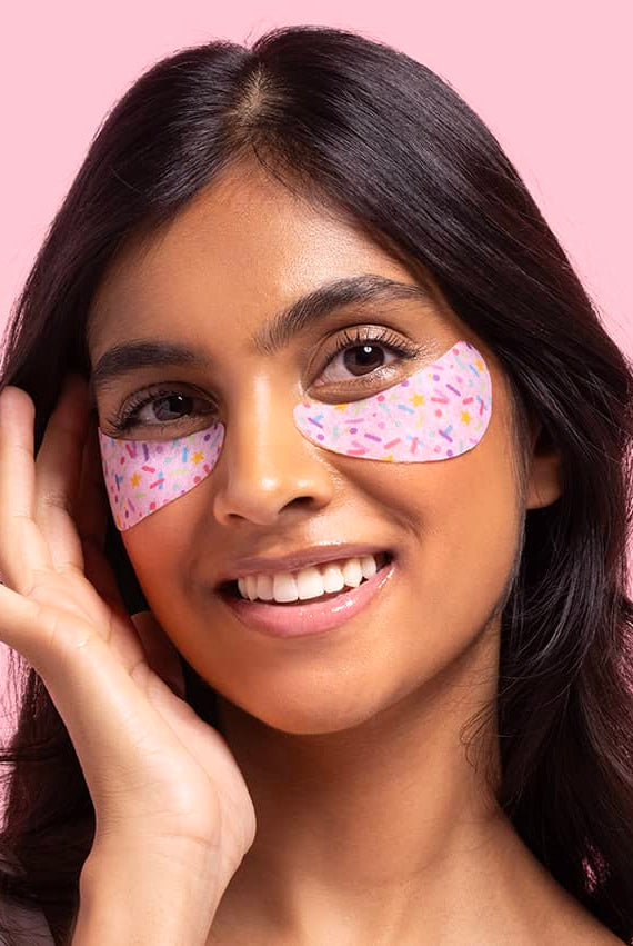 Patchology Eye Want Cake Confetti Eye Gel showing product on model