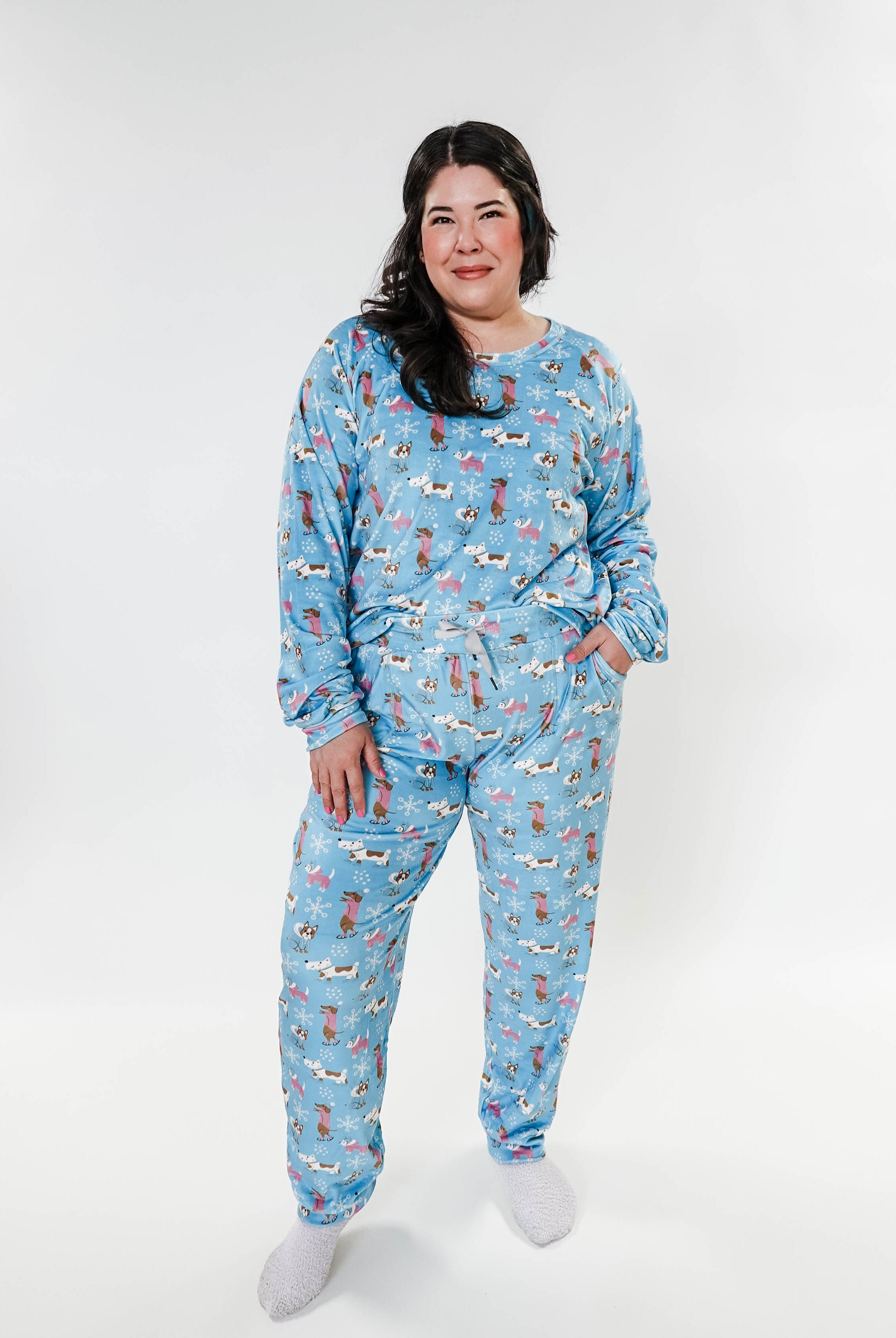 women's dogs on ice skates print velour top and jogger set on blue background - Miranda Nic