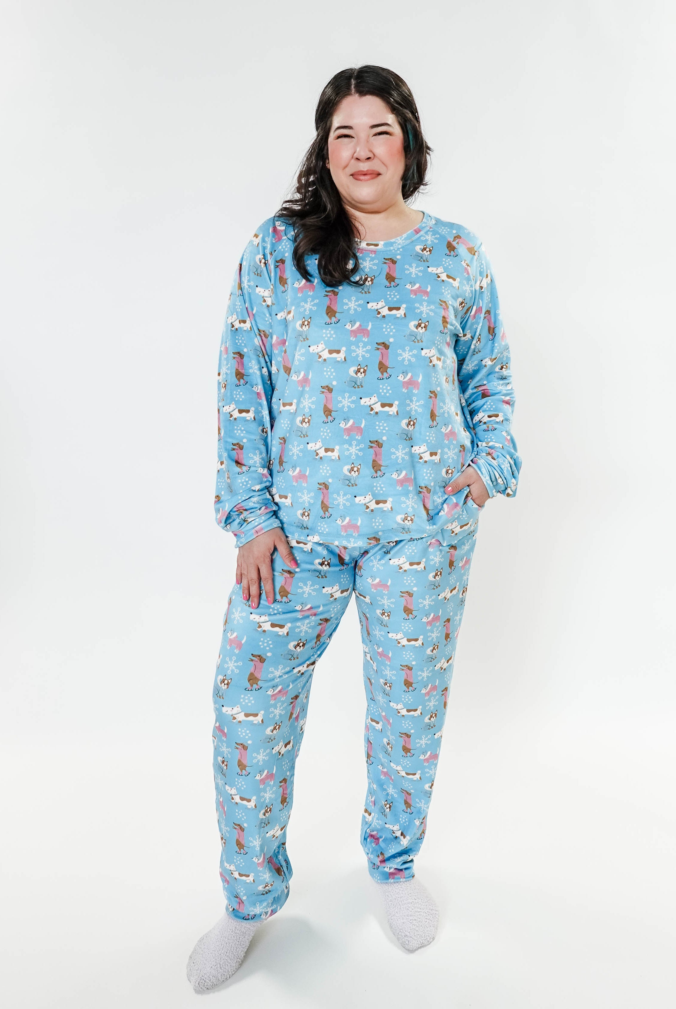 women's dogs on ice skates print velour top and jogger set on blue background - Miranda Nic