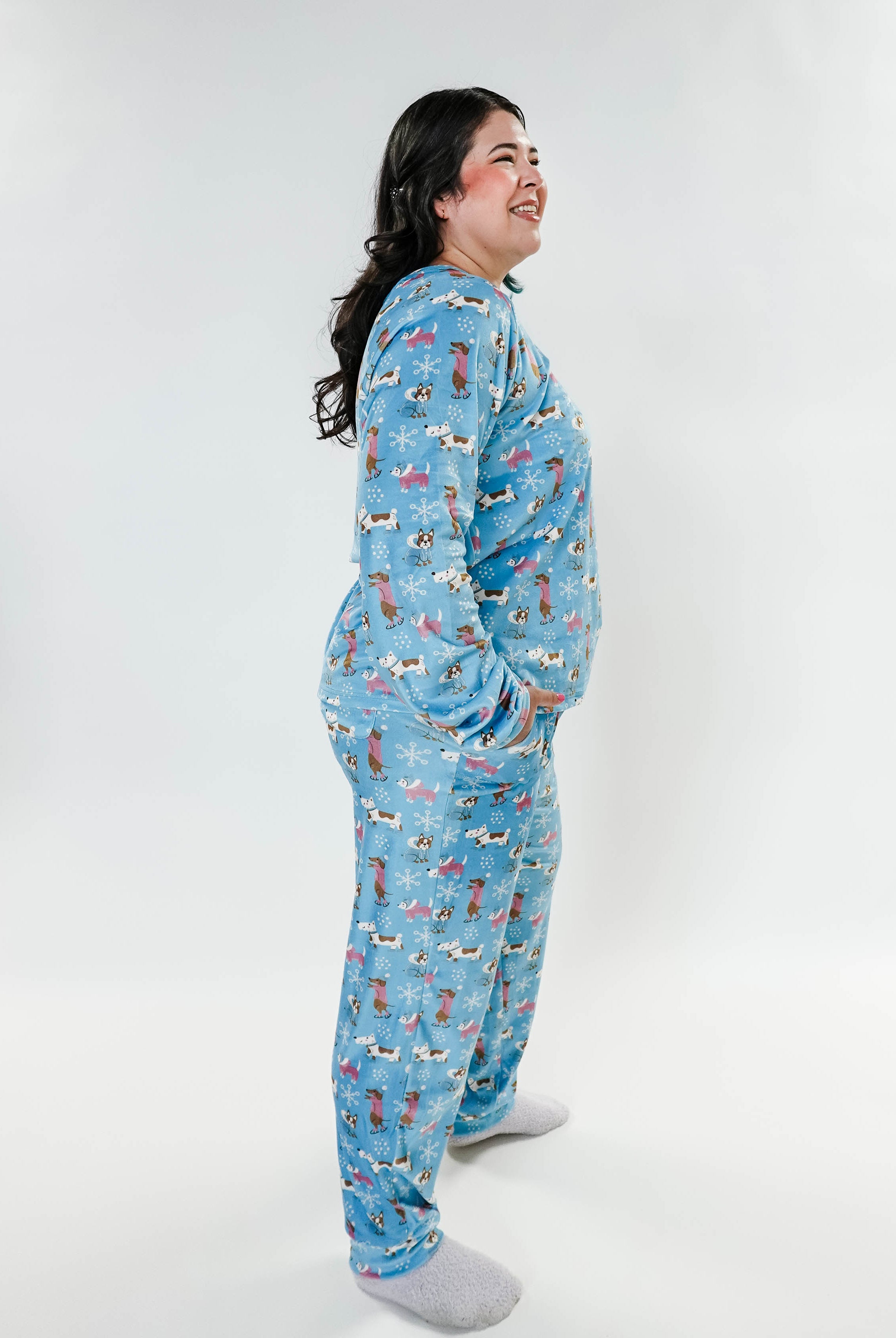 Woman wearing Paws On Ice Long Sleeve Jogger Velour Lounge Set in playful winter-themed design.