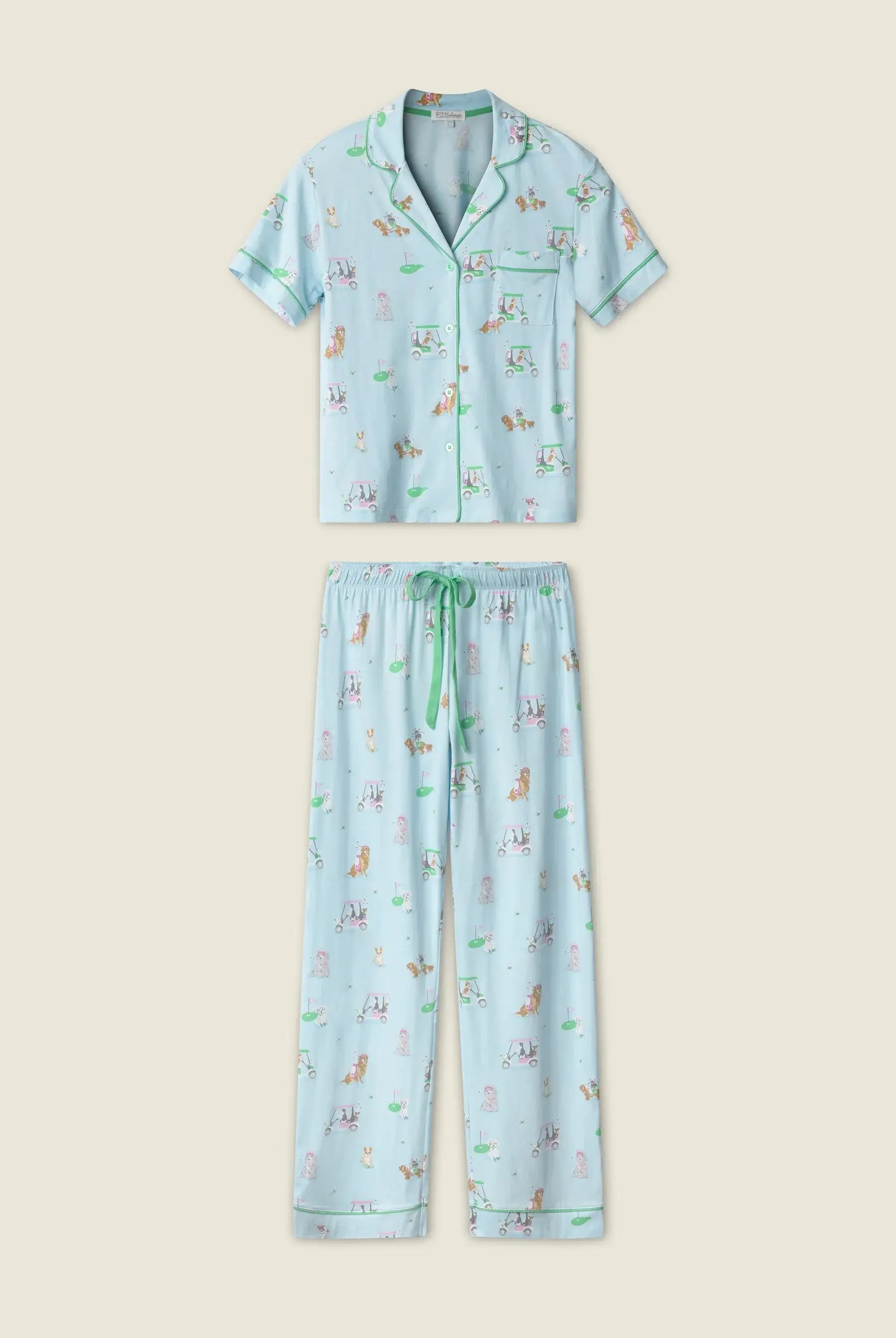 PJ SALVAGE Whimsy Cropped PJ Set in Light Blue Putter Pup print showing dogs golfing. Set shown in a lay flat against a light background