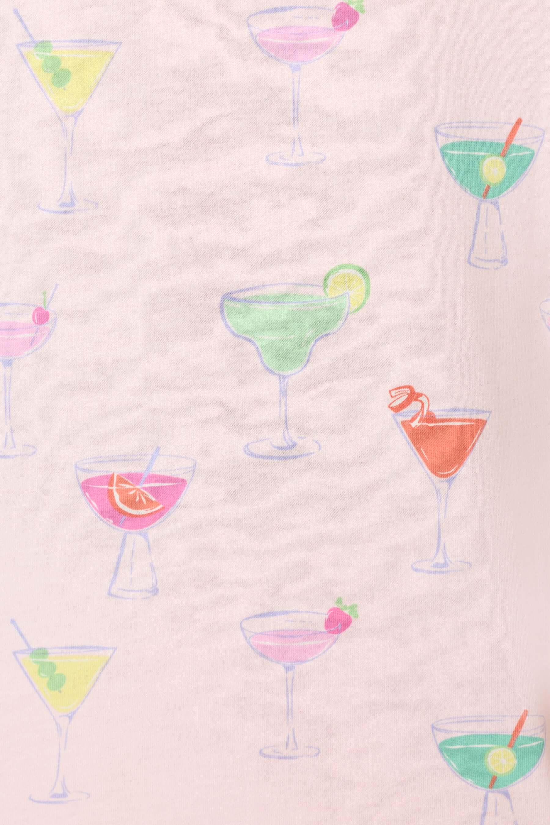 PJ SALVAGE Whimsy Cropped PJ Set in Light Pink Sip Happens print showing cocktail glasses in various colours. Close up of the print