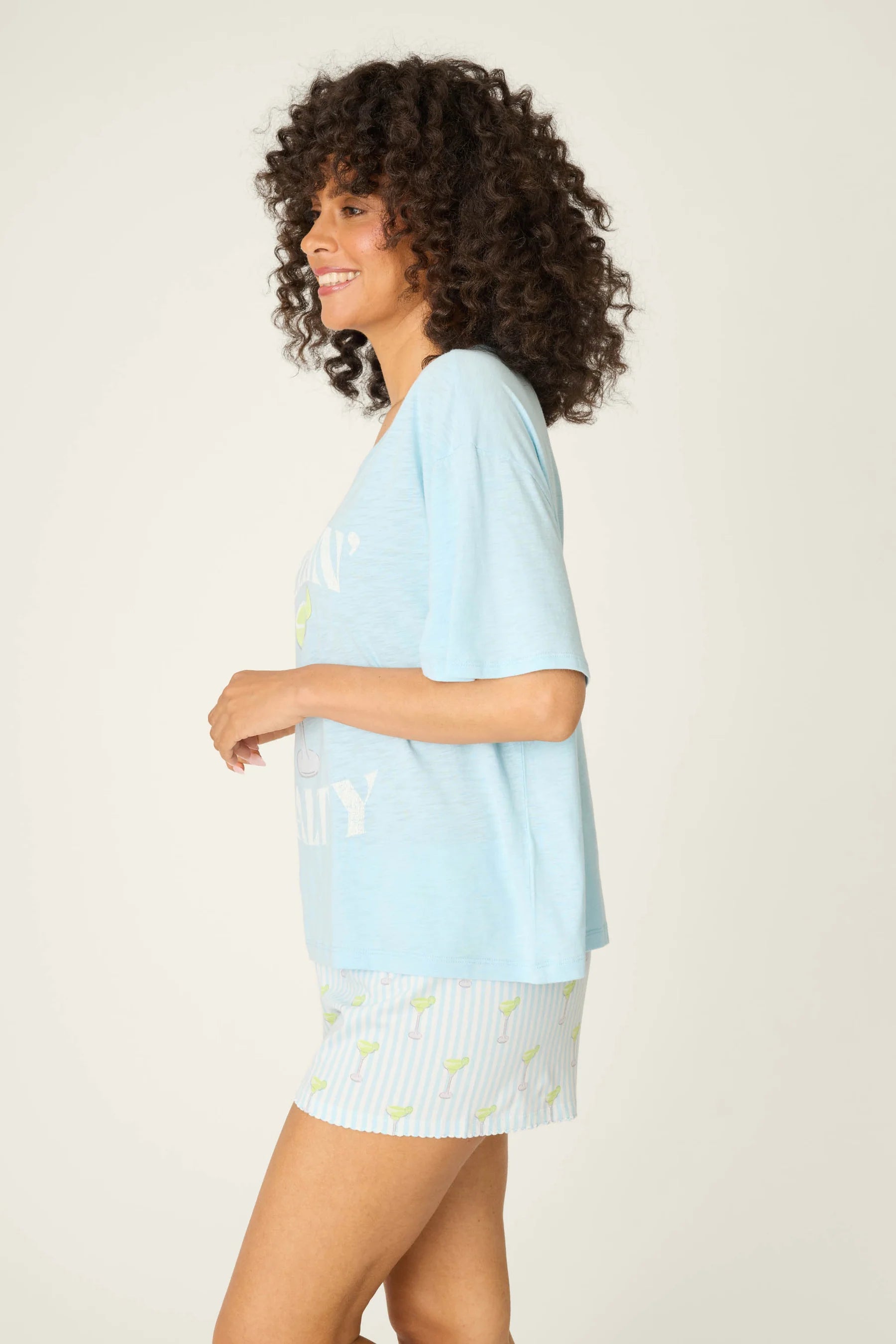 Playful Prints Feeling Salty Graphic Tee by PJ Salvage on a model, featuring light blue color and relaxed fit.