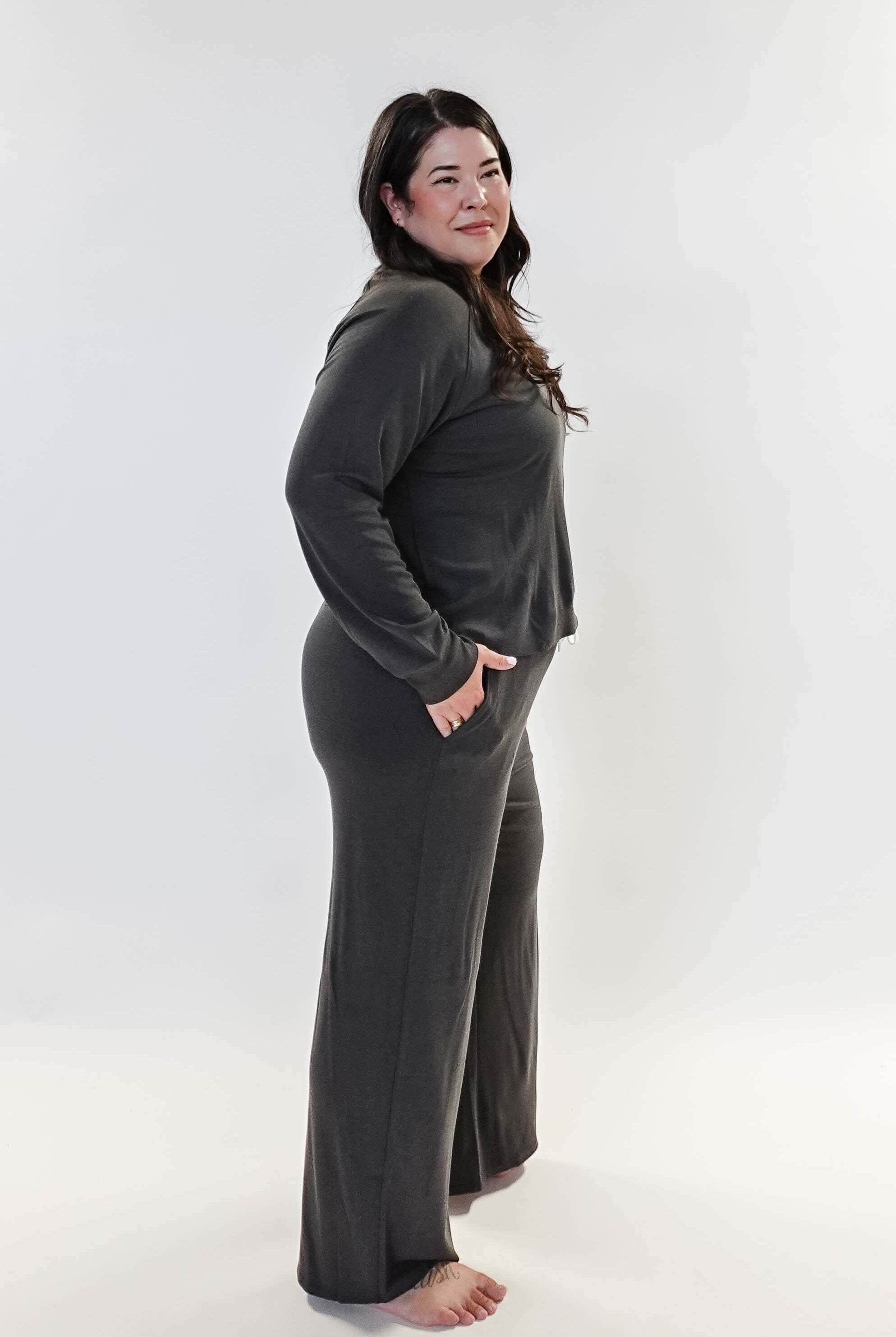 Long Sleeve Raw Edge Straight Pant Lounge Set modeled by a woman in a gray outfit, showcasing comfort and style.