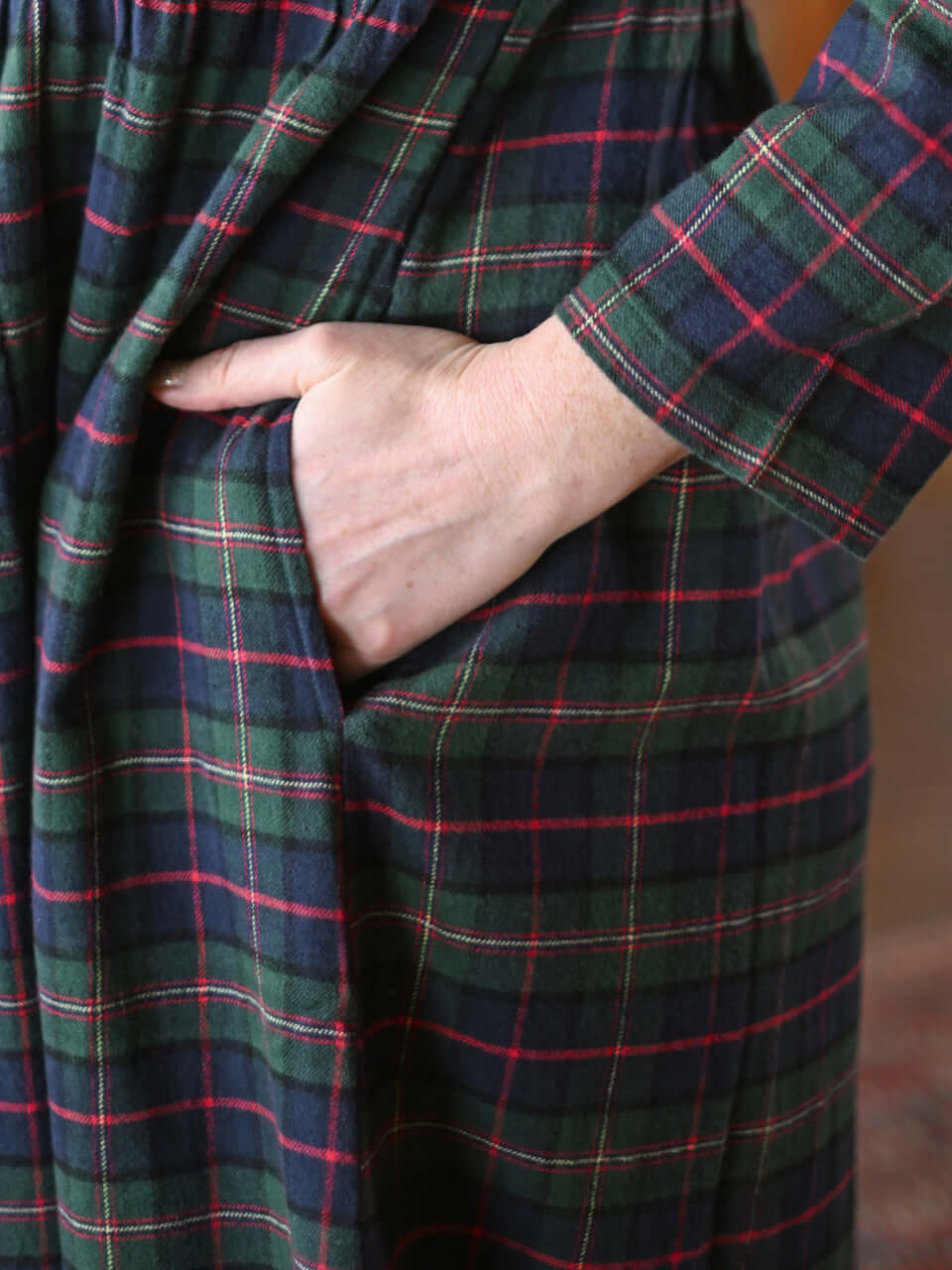 Saratoga Long Flannel Cotton Nightgown in blue plaid, featuring a hand in the pocket for added comfort and style.