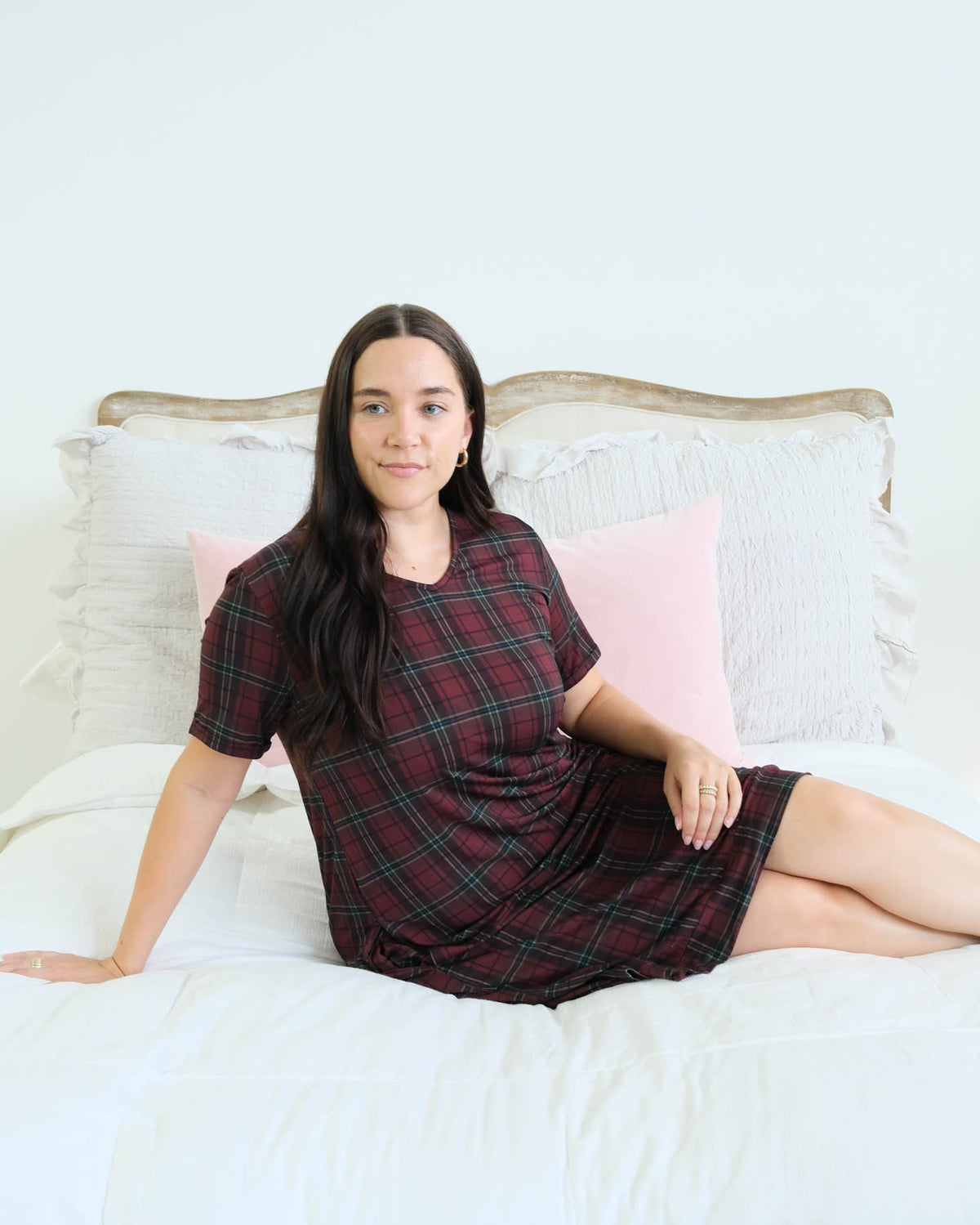 Georgia Rylan Bamboo Plaid V-Neck Nightshirt lifestyle model reclining on bed — Cloud Nine Pajamas Edmonton