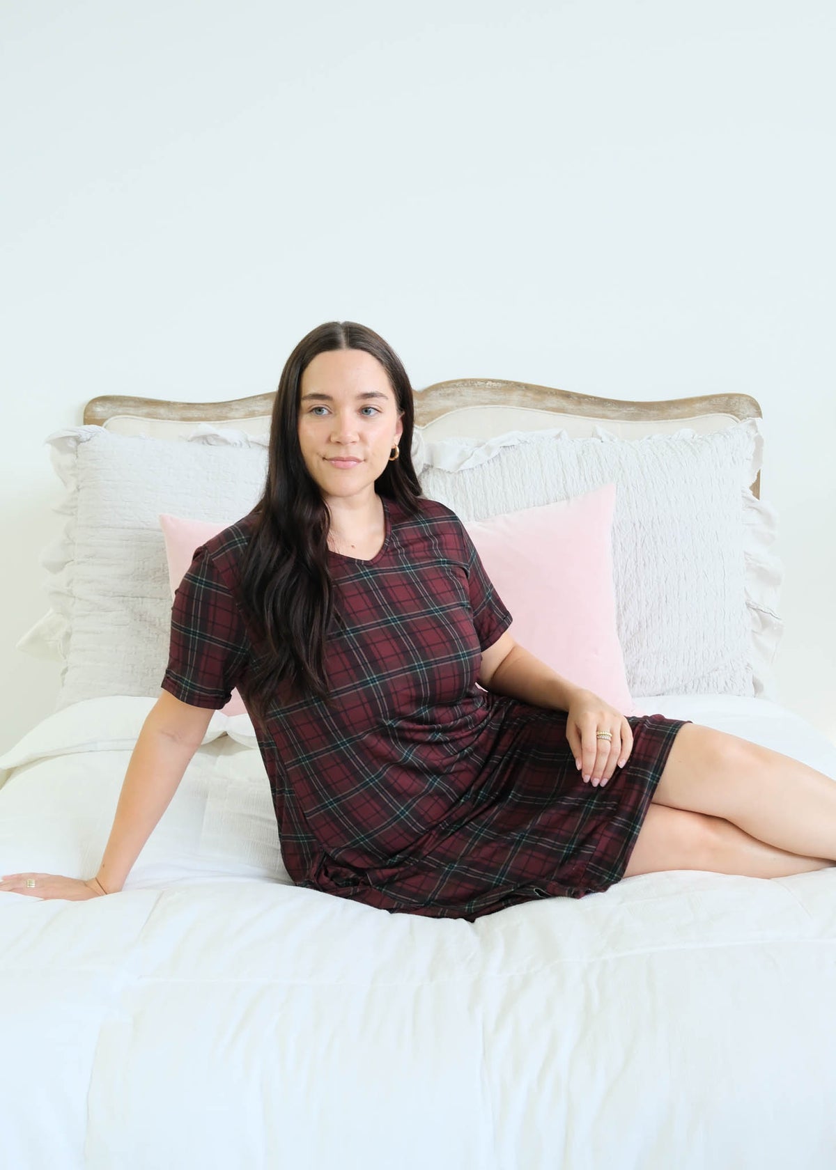 Georgia Rylan Bamboo Plaid V-Neck Nightshirt lifestyle model reclining on bed — Cloud Nine Pajamas Edmonton