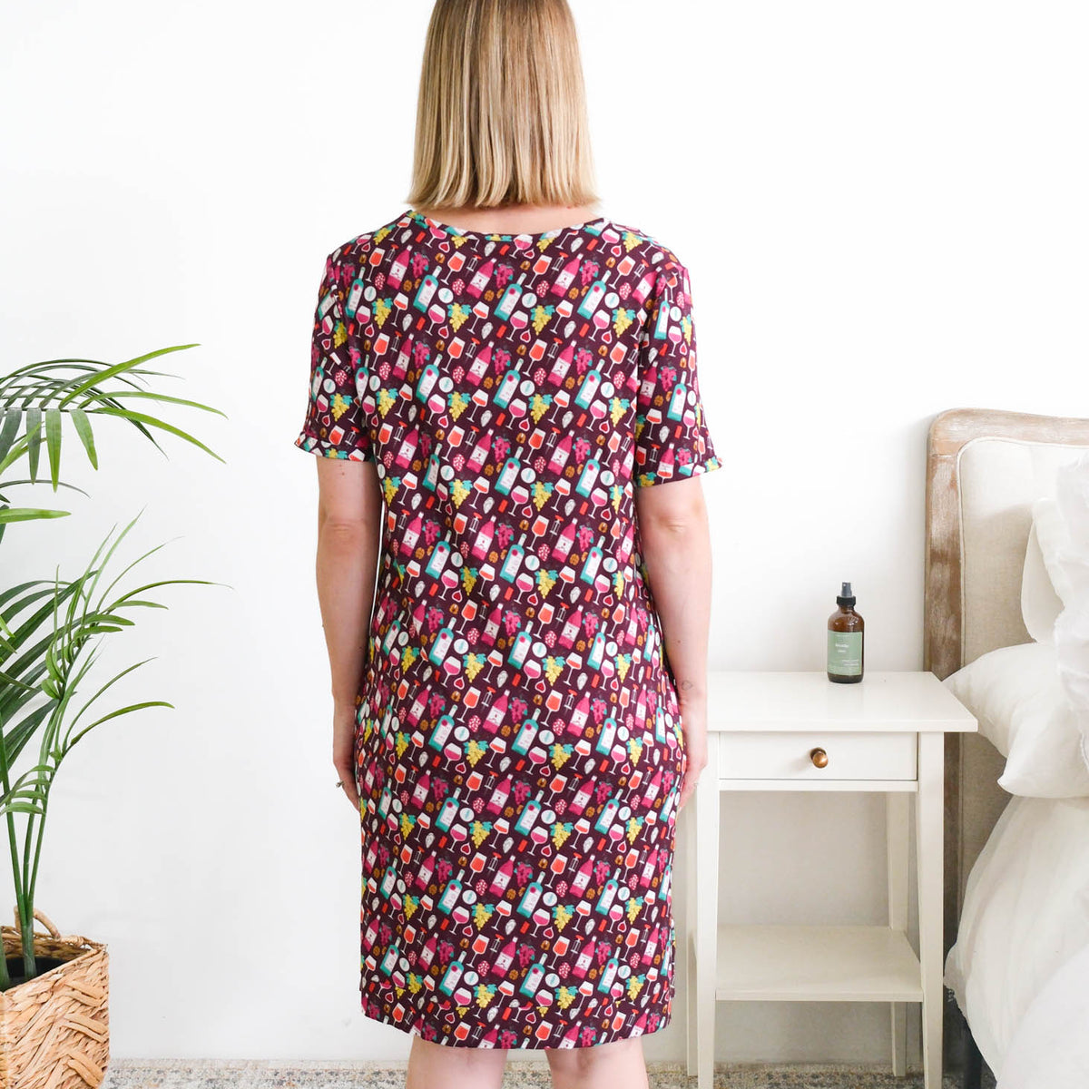 Georgia Rylan Wine Tasting V-Neck Bamboo Nightshirt model back view — Cloud Nine Pajamas Edmonton