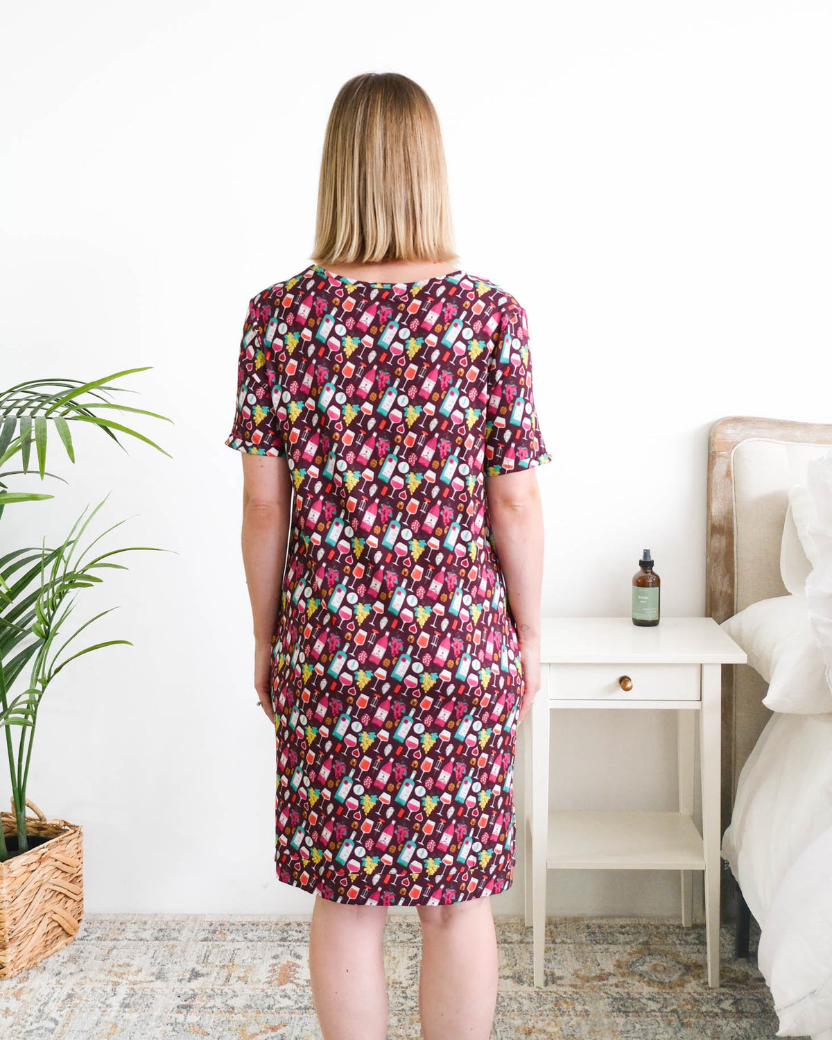 Georgia Rylan Wine Tasting V-Neck Bamboo Nightshirt model back view — Cloud Nine Pajamas Edmonton