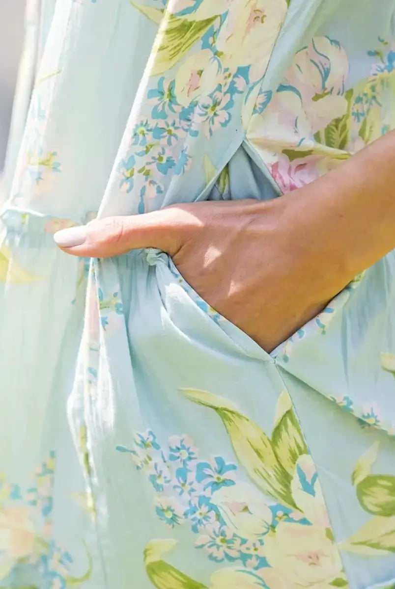 April Cornell Blanche Cotton Dress in Aqua showing pocket detail with model's hand in slit pocket