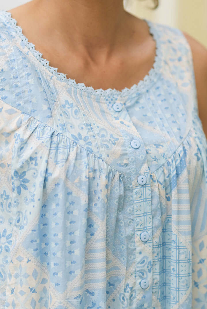 April Cornell Maddie’s Medley Cotton Nightgown – Embroidered Light Blue Sleeveless Nighty with Button Front. Close up showing the light blue button front and pintuck/crochet details.
