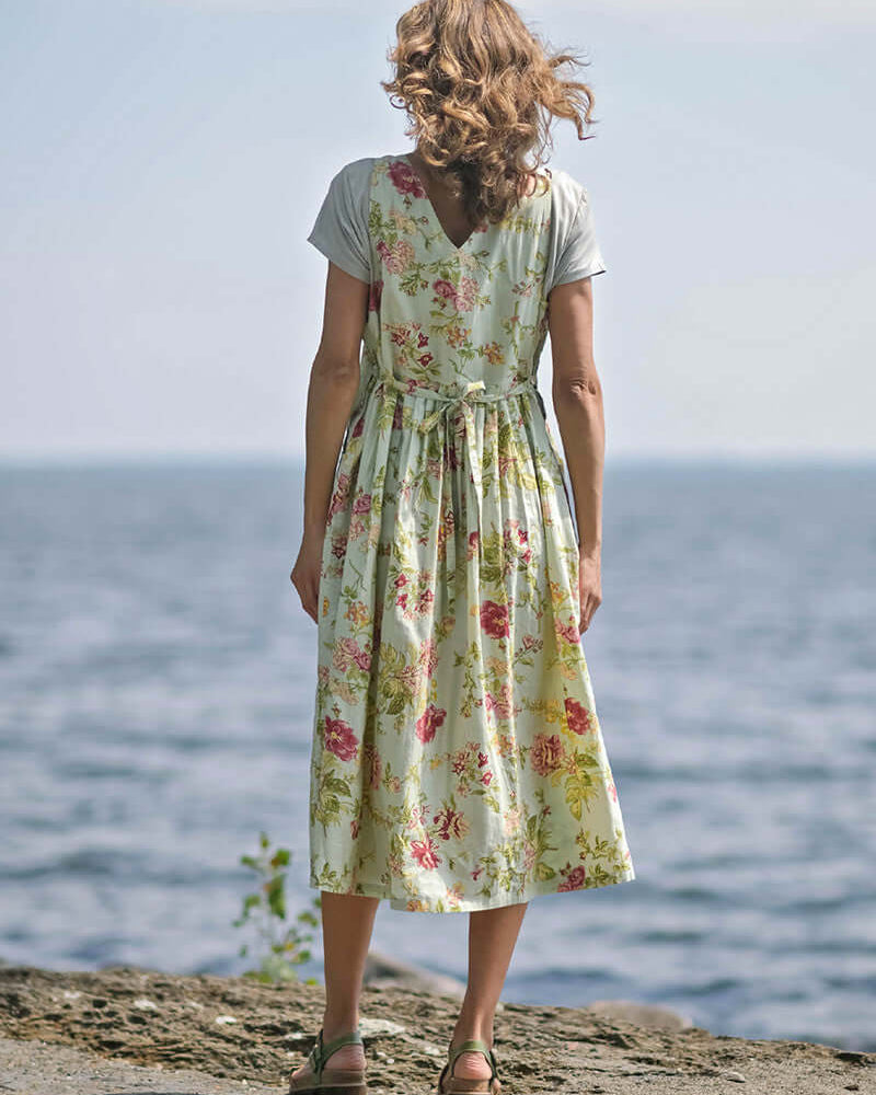 April Cornell Milene Cotton Pinafore Midi Dress Sage Green with Hand-Crochet Neckline showing back and tie details