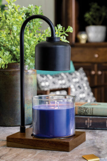 Candle Warmers Etc. Arched Lamp Black and Wood styled in living room with blue candle — Cloud Nine Pajamas