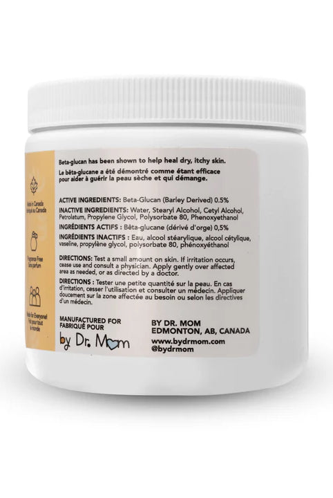 White jar of beta glucan cream with label on a white background