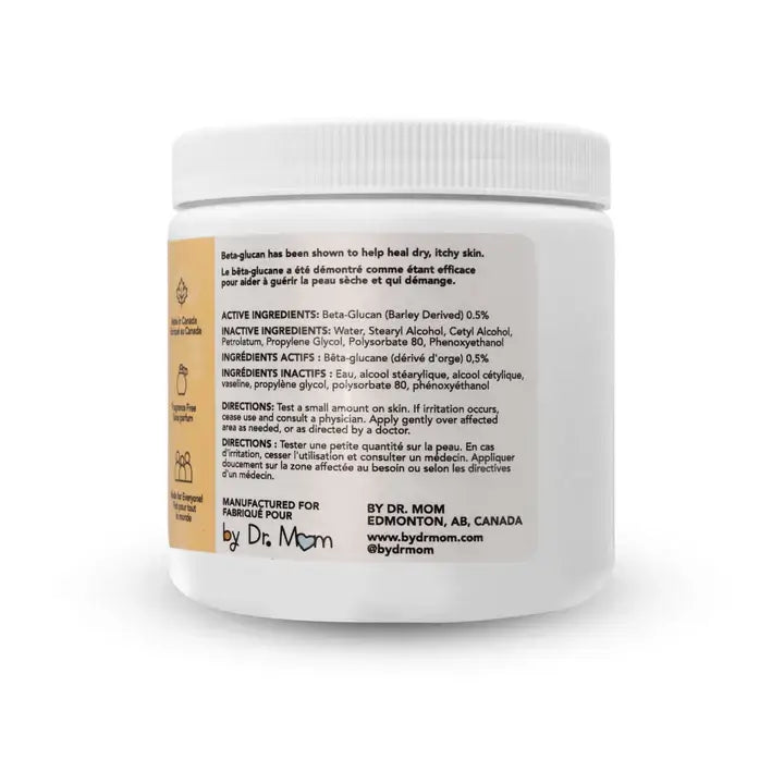 White jar of beta glucan cream with label on a white background
