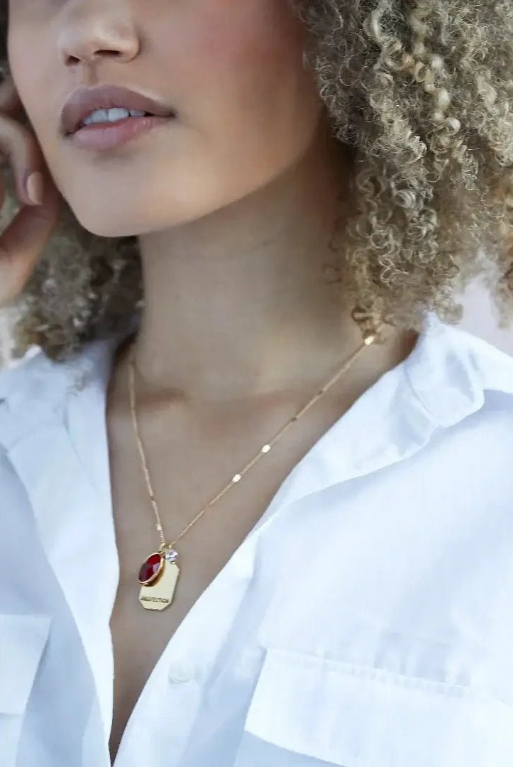 Birthstone Charm Necklace in 14k Plated Gold featuring garnet for January with 'Protection' intention word.
